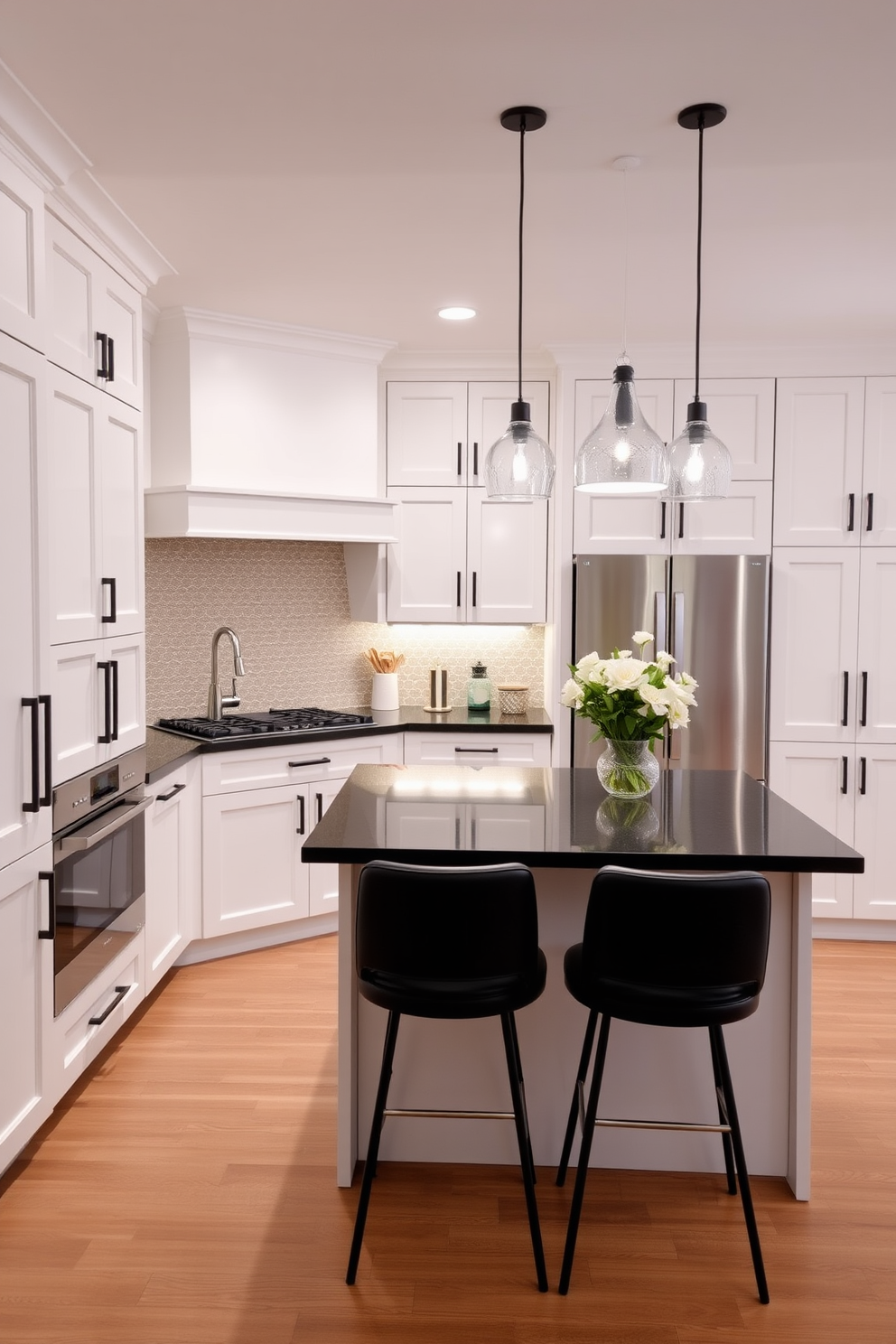 A contemporary kitchen featuring white cabinetry with sleek lines and dark accent hardware. The space includes a large island with a dark countertop, complemented by stylish bar stools and modern pendant lighting overhead.