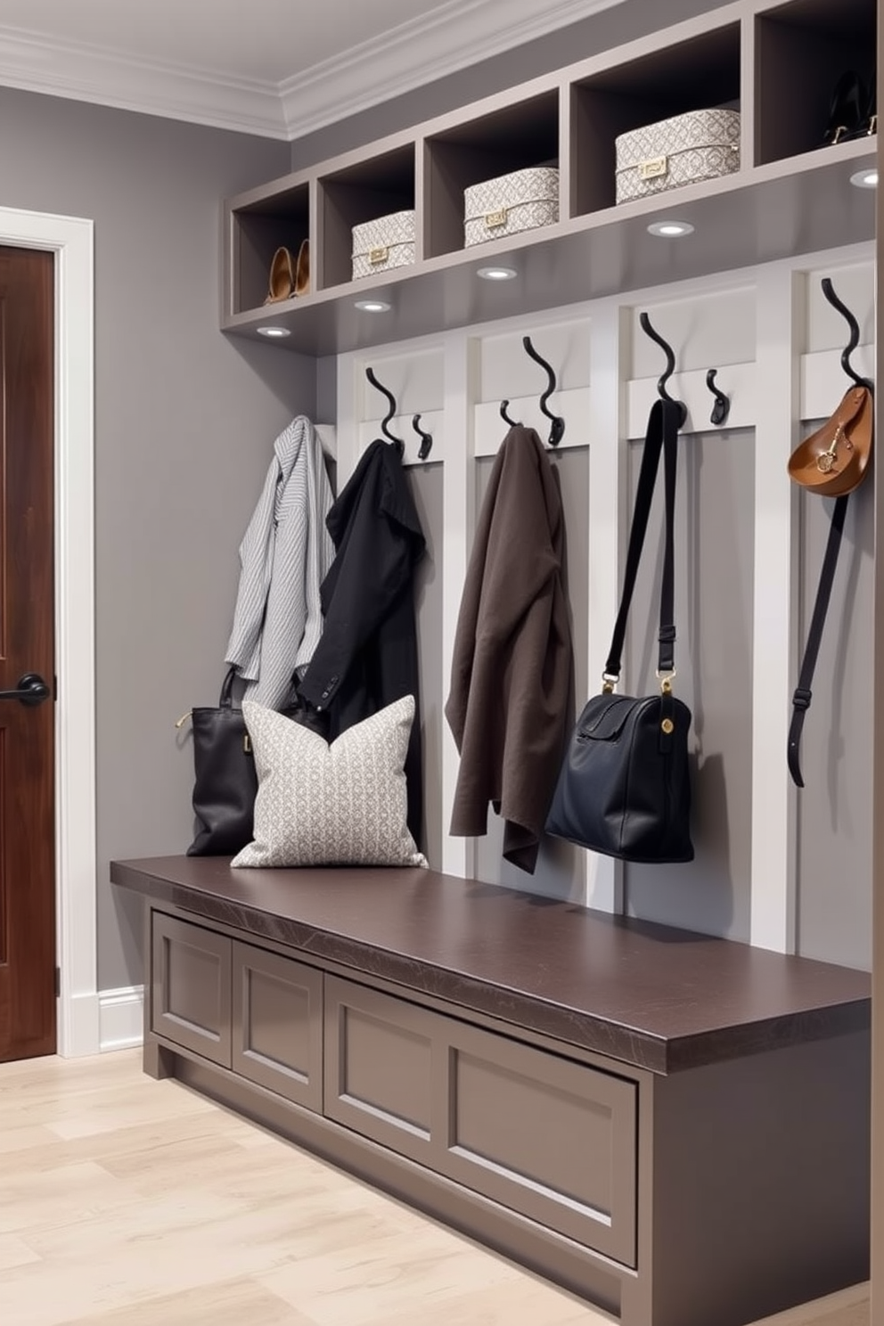 A contemporary mudroom with a built-in bench featuring plush cushions for added comfort. The bench is flanked by stylish storage cubbies and hooks for hanging coats and bags, creating an organized and inviting space.