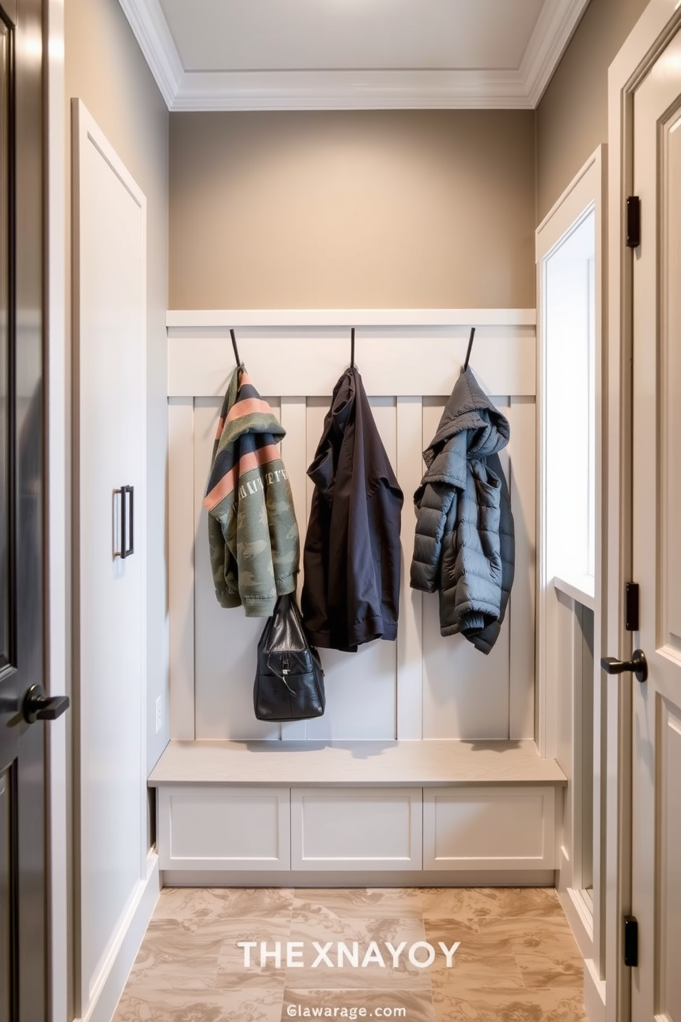 A stylish integrated laundry area within a mudroom features a sleek built-in washer and dryer with cabinetry above for storage. The space is adorned with a combination of light wood and white finishes, complemented by a large bench with cushions for seating. The mudroom is designed with hooks for coats and bags, and a durable tile floor that withstands heavy foot traffic. Natural light floods the area through a window, creating an inviting atmosphere for both laundry and entryway activities.