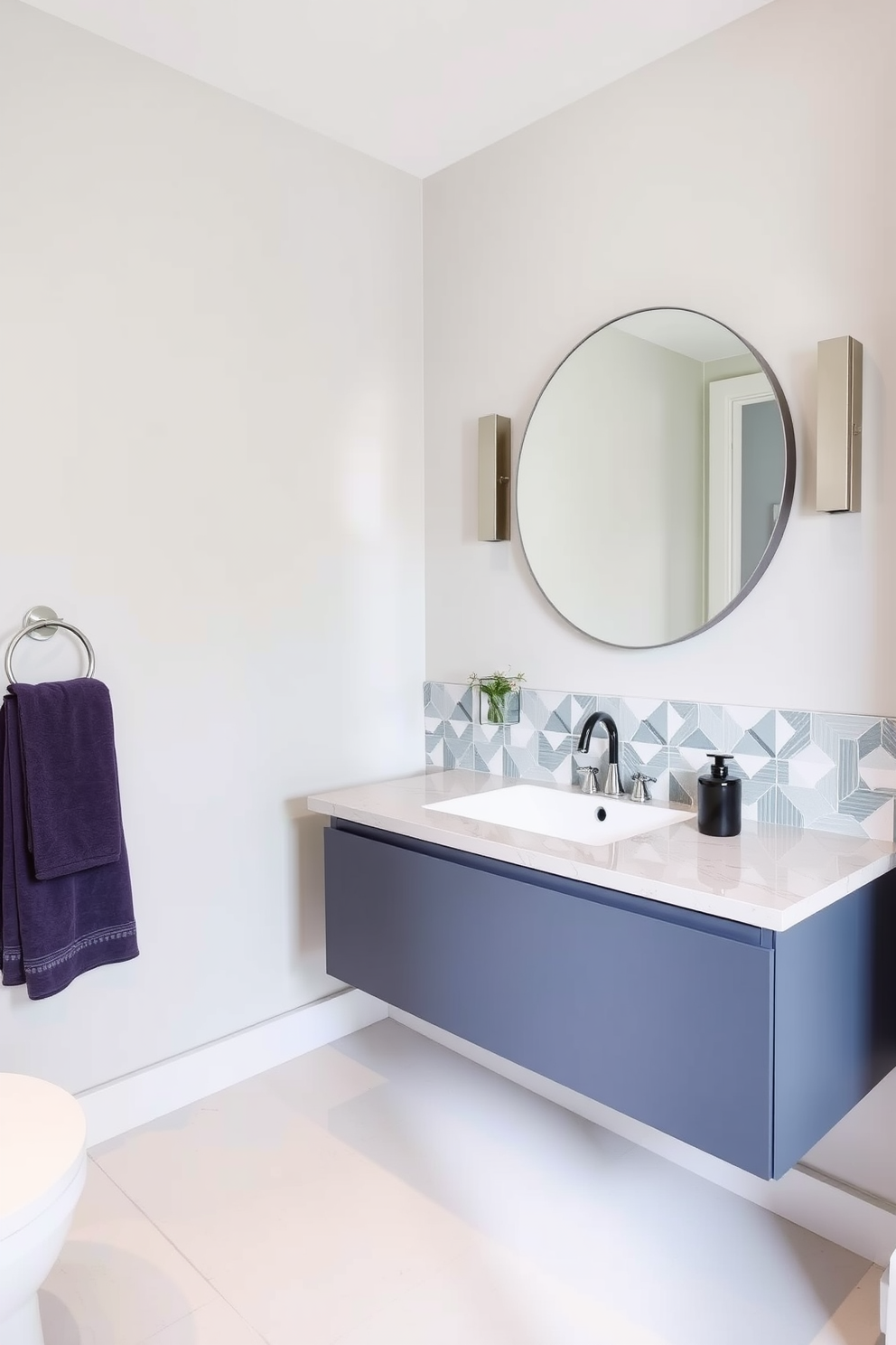 A sleek floating vanity in a vibrant blue hue is the centerpiece of this contemporary powder room. The walls are adorned with geometric patterns in contrasting bold colors, creating a dynamic visual effect. A large round mirror with a thin black frame hangs above the vanity, reflecting stylish wall sconces on either side. The floor features glossy black tiles that enhance the modern aesthetic and add a touch of elegance.