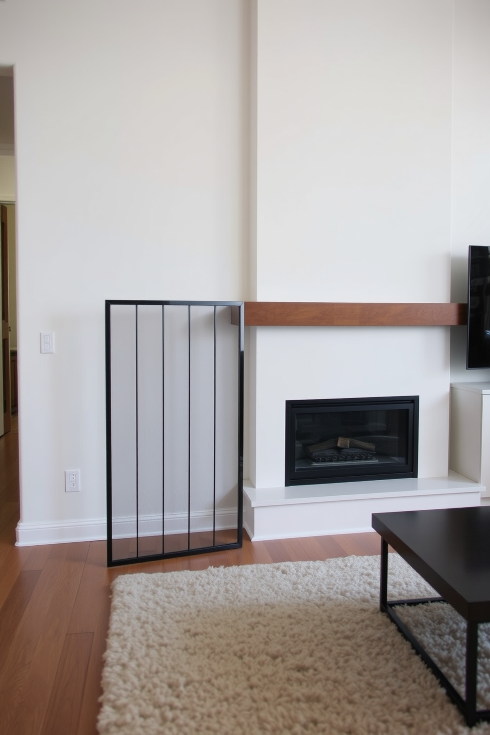 A modern fireplace screen made of sleek black metal stands in front of a cozy corner fireplace. The living room features a minimalist design with neutral-colored walls and a plush area rug, creating an inviting atmosphere.