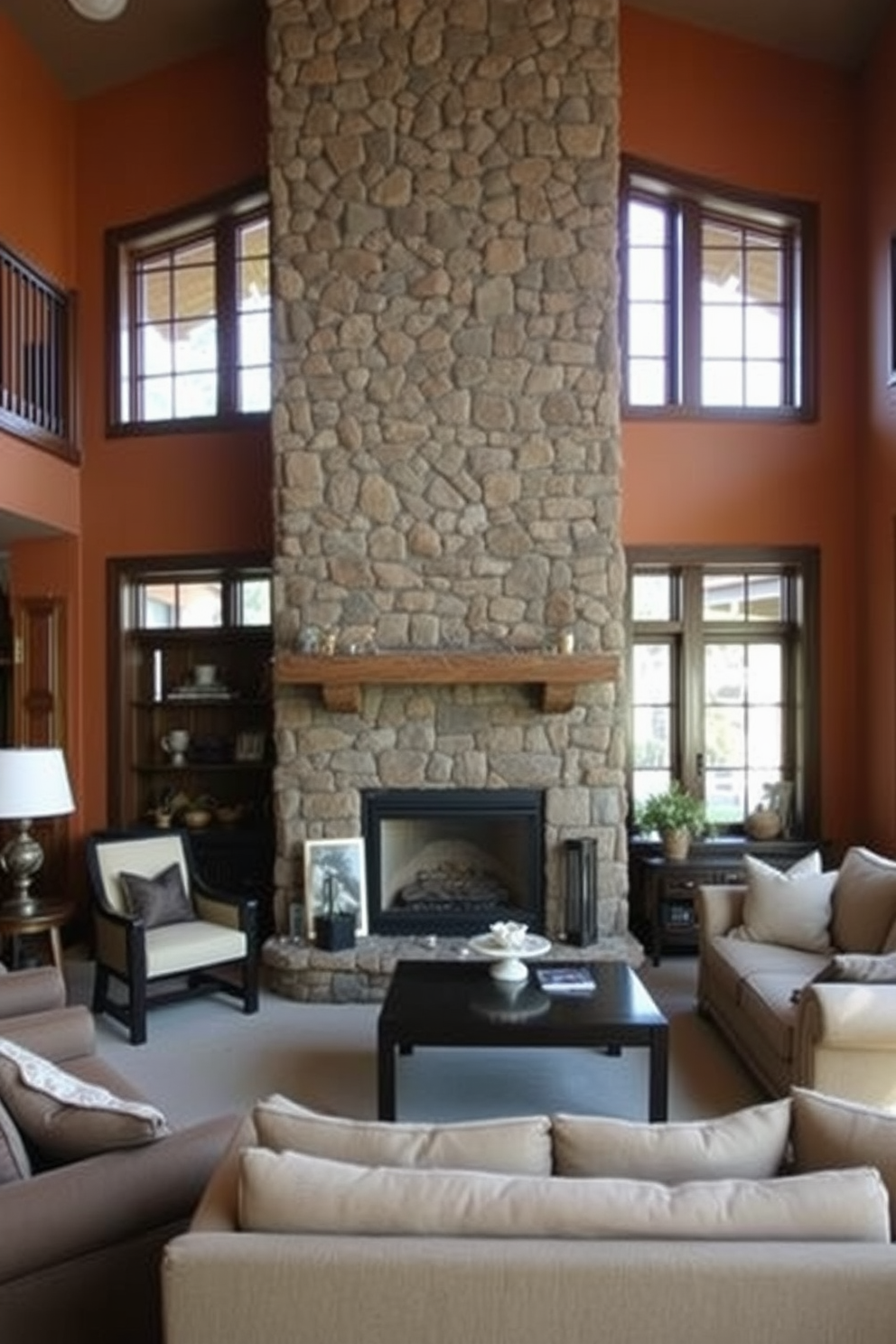 A cozy living room featuring a corner fireplace made of natural stone. The fireplace is surrounded by comfortable seating arrangements, with plush sofas and accent chairs that invite relaxation. The walls are adorned with warm, earthy tones, enhancing the inviting atmosphere. Natural light floods the space through large windows, illuminating the rich textures of the stone and the warmth of the wooden accents.