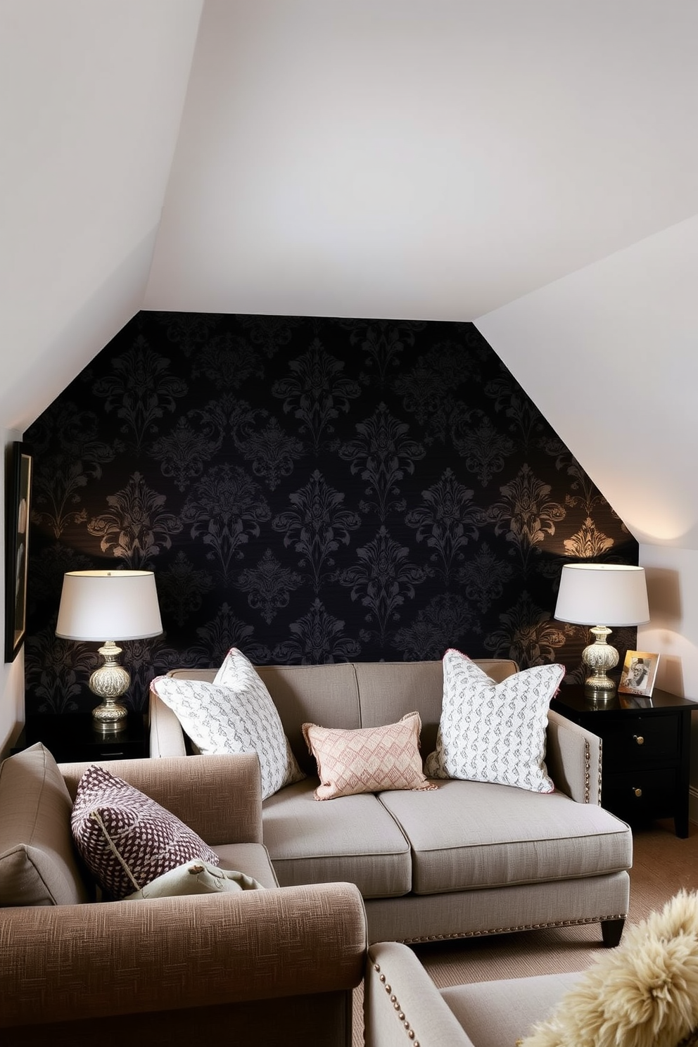 A striking accent wall features dark wallpaper with intricate patterns that add depth and drama to the space. The surrounding walls are painted in a complementary light shade to enhance the richness of the wallpaper. The attic room is designed with cozy, sloped ceilings that create an intimate atmosphere. Soft lighting and plush furnishings invite relaxation while maximizing the use of the unique architectural features.