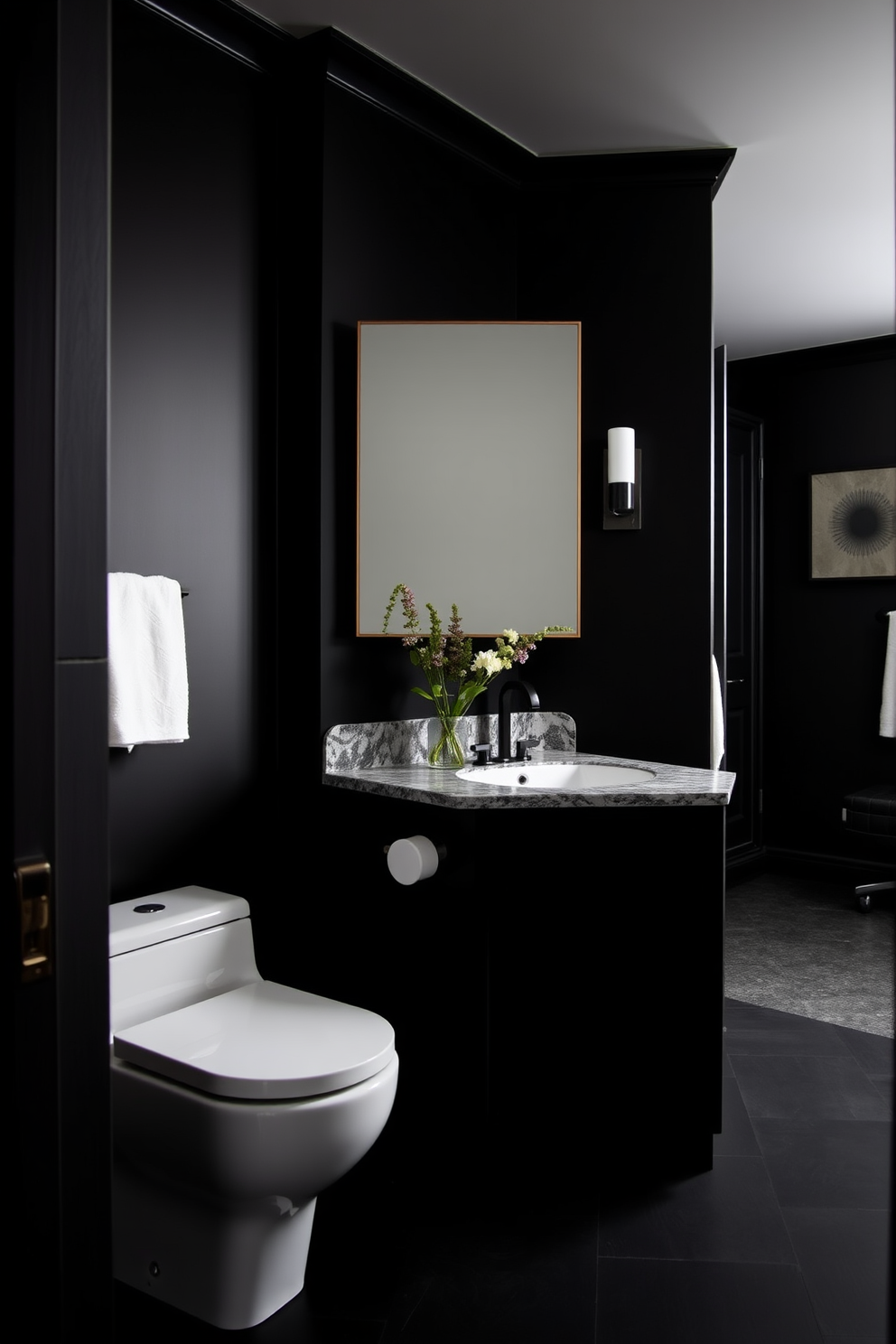 A striking black freestanding bathtub takes center stage in a luxurious dark bathroom. The walls are adorned with deep charcoal tiles, creating a moody and sophisticated atmosphere. Soft ambient lighting highlights the sleek lines of the bathtub, while a stylish floor lamp adds a touch of elegance. A minimalist wooden shelf holds plush towels and aromatic candles, enhancing the serene vibe of the space.