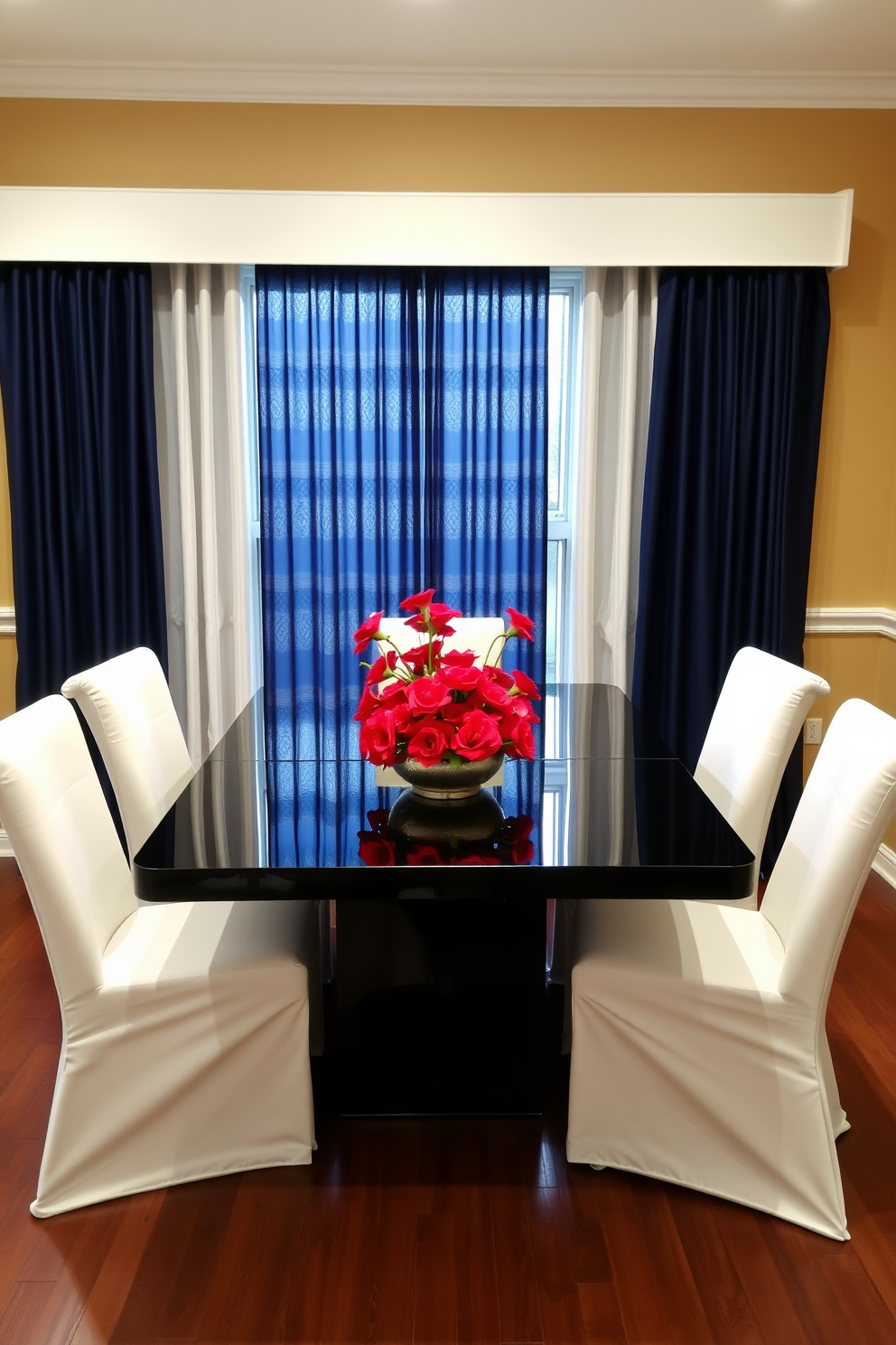 A modern dining room featuring a sleek black table surrounded by white upholstered chairs. The walls are painted in a warm beige, while the curtains are a deep navy blue, adding a touch of elegance. A striking centerpiece of vibrant red flowers sits atop the table, drawing attention. The floor is a rich walnut wood, contrasting beautifully with the light tones of the furniture and decor.