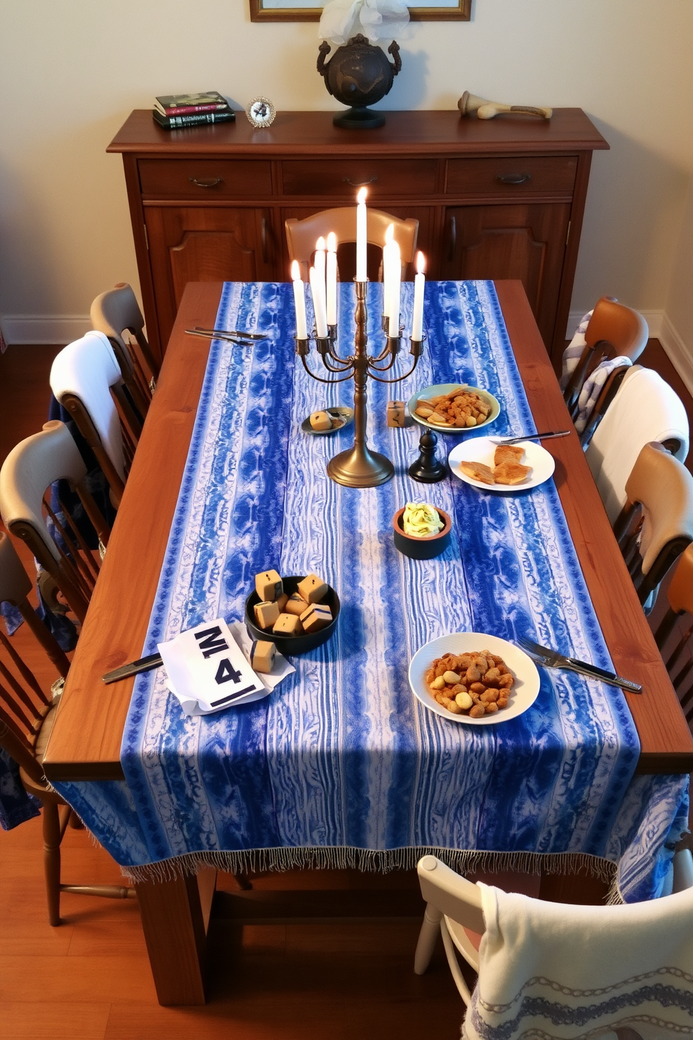 A bright and inviting dining room filled with fresh greenery. The centerpiece is a large wooden table adorned with an array of potted plants and candles for a festive Hanukkah atmosphere. The walls are painted in soft white, allowing the vibrant green foliage to stand out. Elegant blue and silver decor elements complement the natural touches, creating a warm and welcoming space.