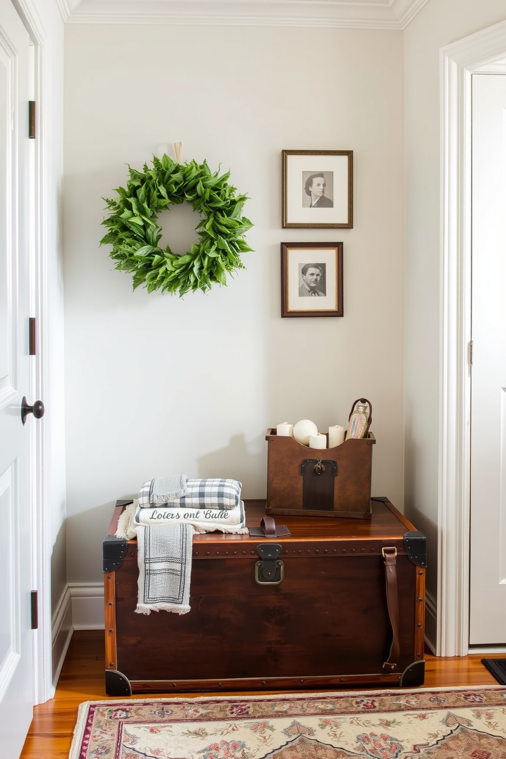 A charming entrance foyer featuring a vintage trunk used as a unique storage solution. The walls are adorned with soft pastel colors, and a stylish area rug adds warmth to the space.