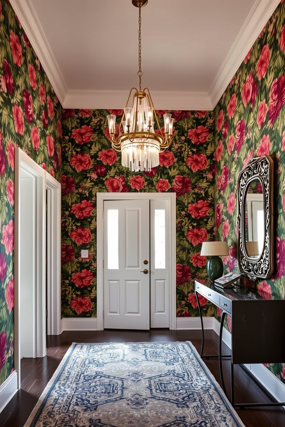 A stunning entryway featuring bold wallpaper that showcases a vibrant floral pattern. The space is illuminated by a modern chandelier that hangs gracefully from the ceiling, enhancing the dramatic effect of the wallpaper. To the right, a sleek console table holds a decorative mirror with an ornate frame. A stylish area rug anchors the space, adding warmth and texture to the entryway design.