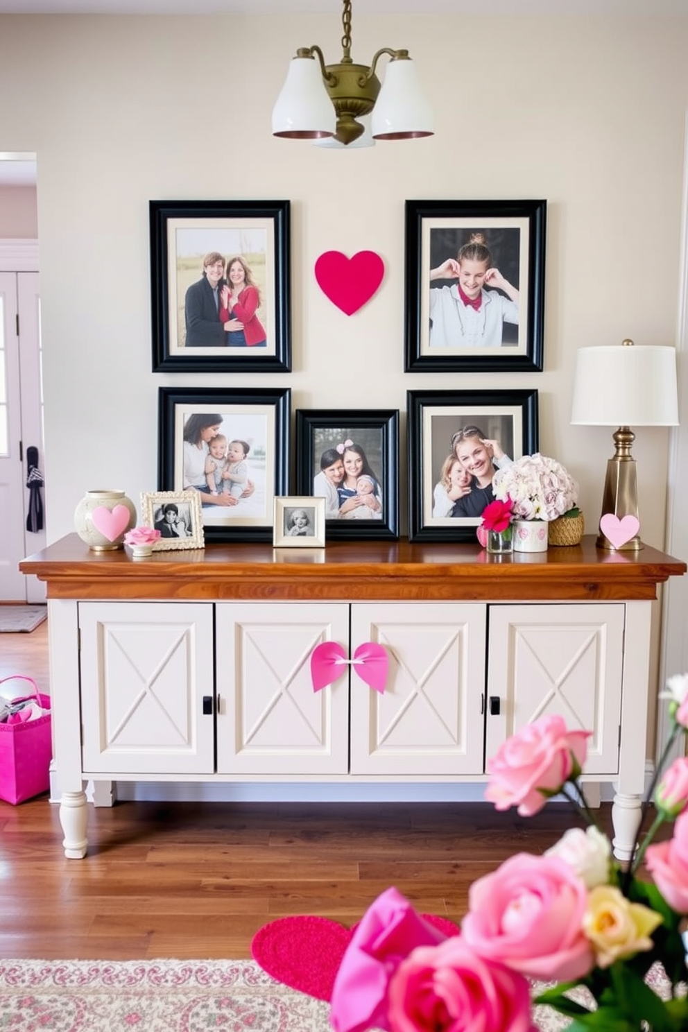 A warm and inviting entryway adorned with framed photos of loved ones displayed prominently on a wooden console table. The space is enhanced with soft lighting and seasonal decorations that reflect Valentine's Day, featuring heart-shaped accents and fresh flowers in pastel hues.