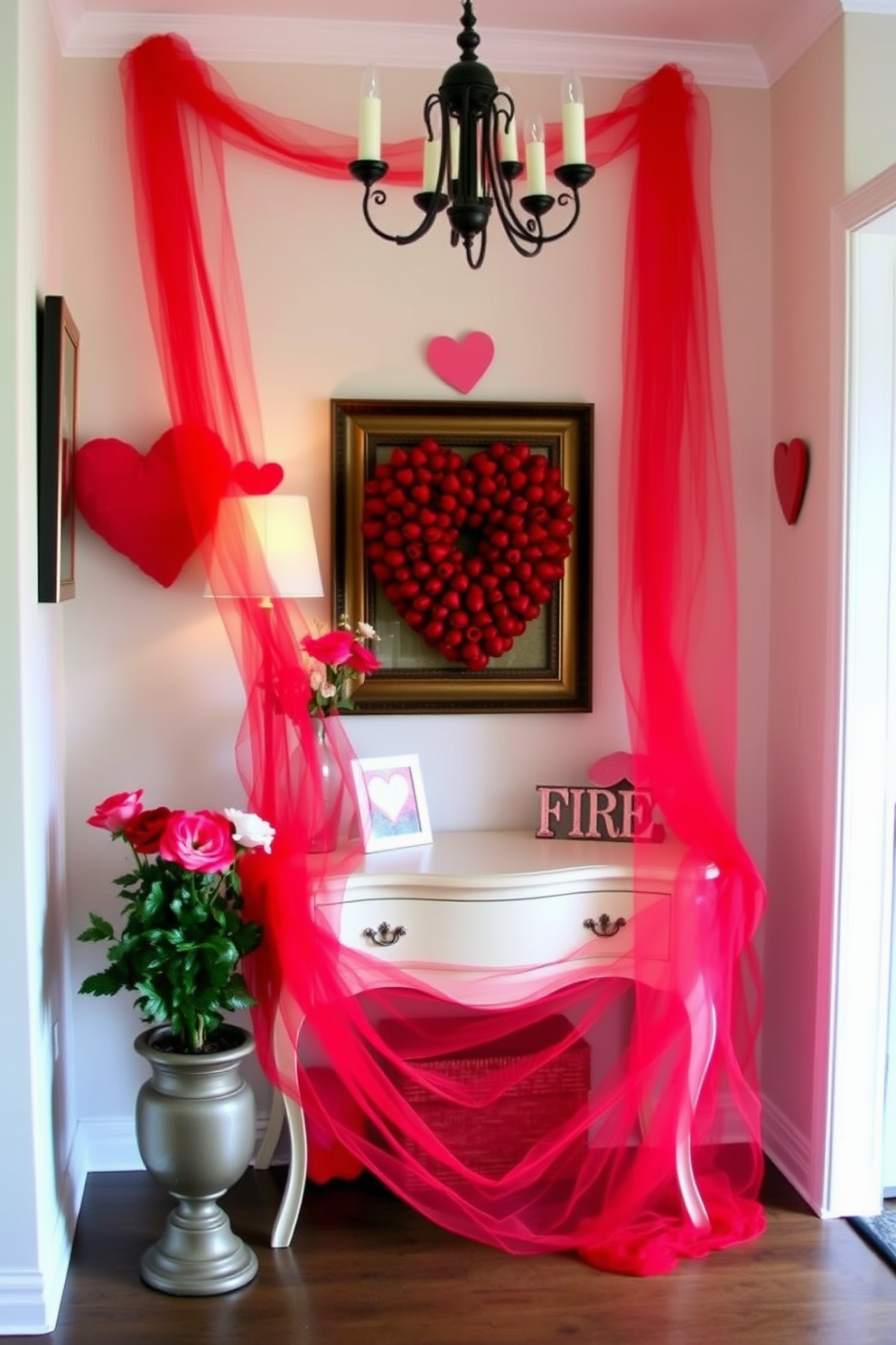 A charming entryway adorned for Valentine's Day features red tulle draped elegantly over a vintage console table. Soft lighting enhances the romantic atmosphere, while heart-shaped decorations and fresh flowers add a festive touch.