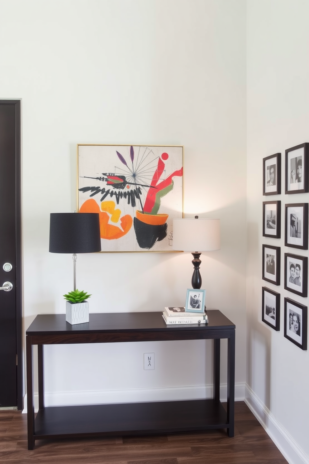 A stylish entryway features a sleek console table made of dark wood, adorned with a decorative lamp and a small potted plant. Above the table, a large abstract piece of wall art adds a pop of color, creating an inviting focal point for guests. The walls are painted in a soft neutral tone, providing a warm backdrop for the console table. To enhance the space, a series of framed black and white photographs are arranged in a gallery style, adding personality and charm to the entryway.