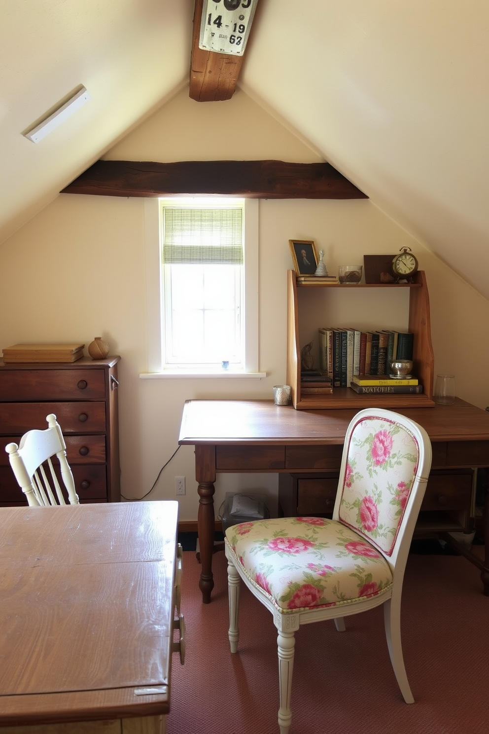 A cozy attic space featuring repurposed furniture with a vintage touch. A weathered wooden table serves as a desk, accompanied by a mismatched set of chairs adorned with floral upholstery. Soft natural light filters through a small window, illuminating a collection of antique books and trinkets displayed on a rustic shelf. The walls are painted in a warm cream color, enhancing the inviting atmosphere of the room.