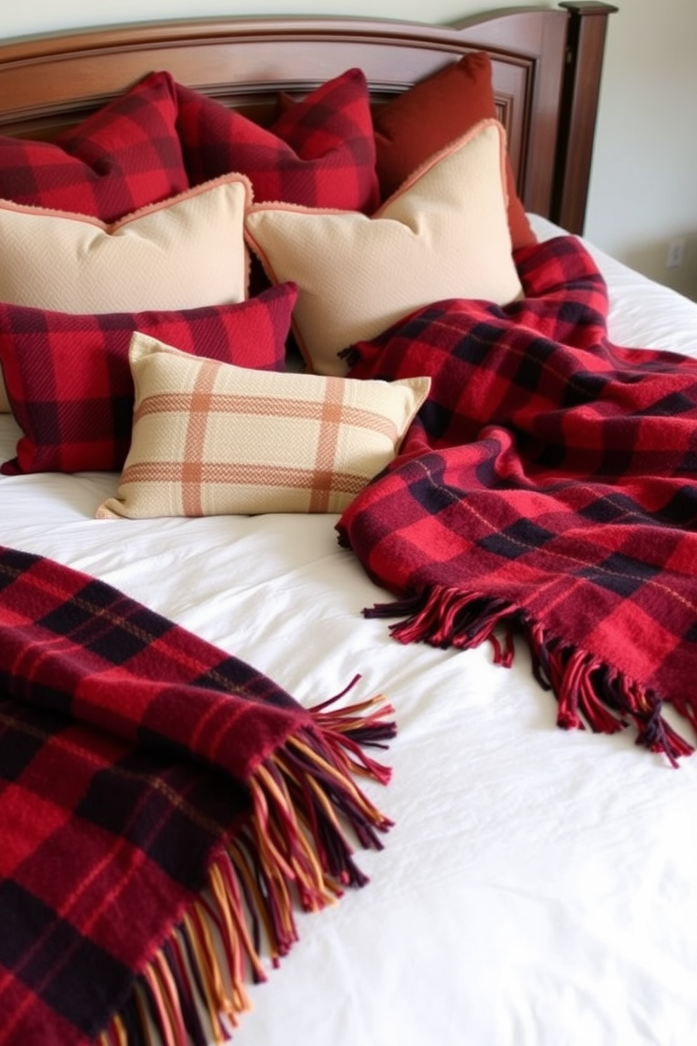 A cozy bedroom setting featuring a plush bed adorned with warm plaid throw blankets in rich autumn colors. Surrounding the bed are decorative pillows that complement the blankets, creating an inviting atmosphere perfect for fall.