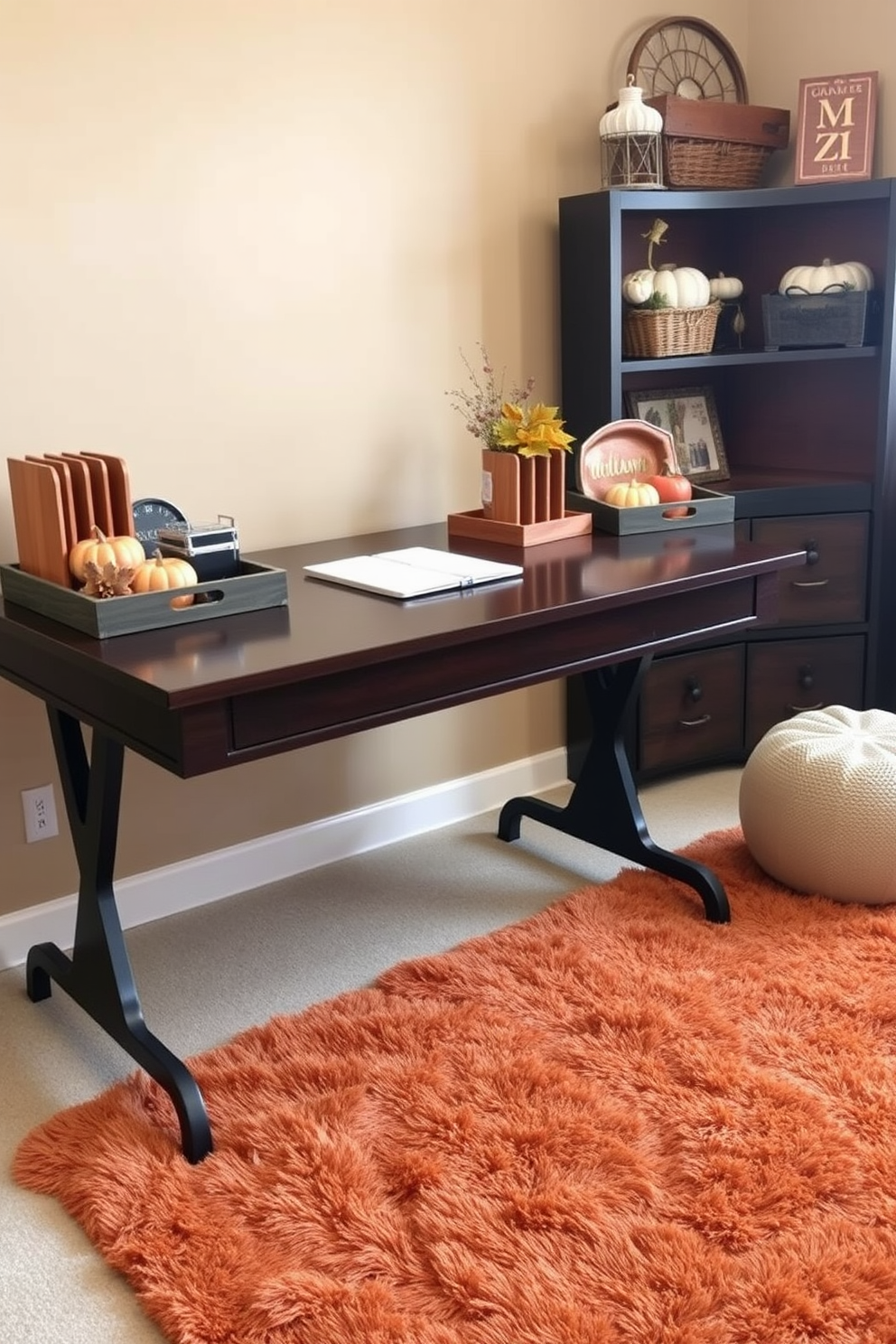 A cozy home office setting adorned with autumn-themed desk organizers and trays. The desk features wooden organizers in warm hues, complemented by decorative trays showcasing seasonal elements like pumpkins and leaves. The walls are painted in a soft beige, creating a warm backdrop for the rich colors of fall. A plush, rust-colored rug lies under the desk, adding comfort and style to the workspace.