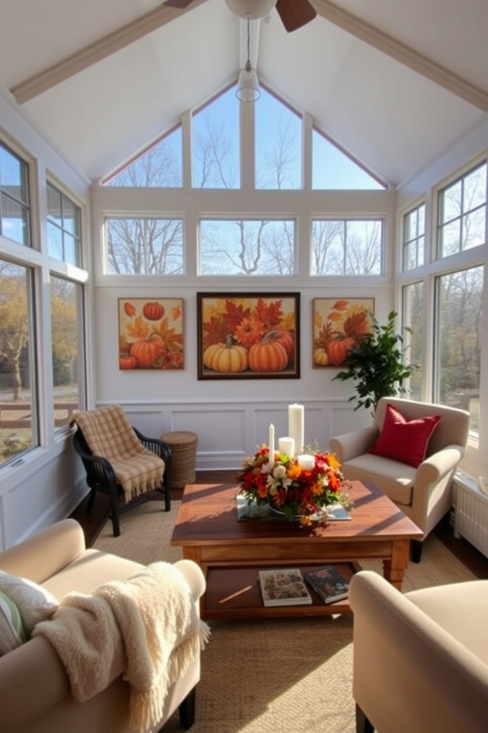 A cozy sunroom filled with natural light and adorned with various candles that emit warm fall scents. The space features plush seating with autumn-colored throw pillows and a rustic wooden coffee table surrounded by potted plants and seasonal decorations.