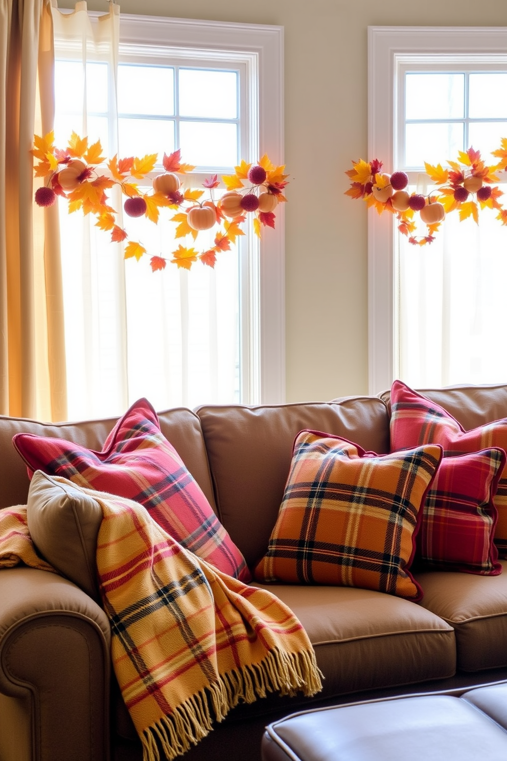 A cozy living room featuring plaid fabric accents in warm tones. The plaid throw pillows and blanket draped over the couch create a welcoming atmosphere. For fall window decorating ideas, the windows are adorned with seasonal garlands made of colorful leaves and small pumpkins. Soft, sheer curtains allow natural light to filter through, enhancing the autumnal vibe.