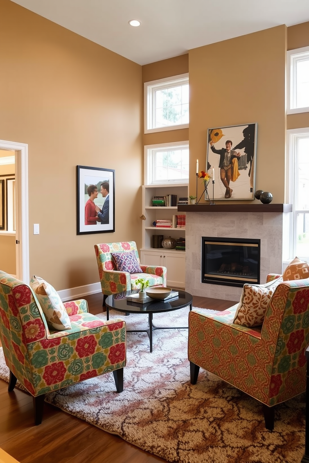 A cozy family room featuring colorful accent chairs positioned near a modern fireplace. The walls are painted in a warm neutral tone, and a plush area rug anchors the seating arrangement.