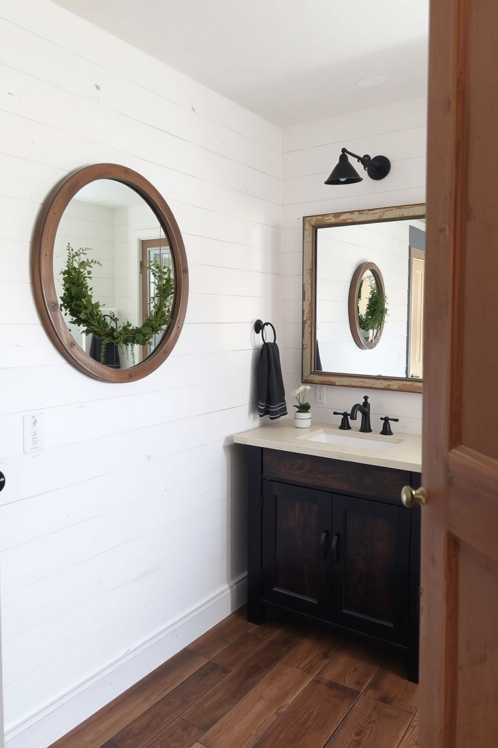 A charming farmhouse bathroom featuring rustic decor accents. The space includes a freestanding soaking tub surrounded by shiplap walls and a vintage ladder holding fluffy towels. A reclaimed wood vanity with a farmhouse sink complements the decor. Above the vanity, a large round mirror with a distressed frame reflects the warm, inviting atmosphere.