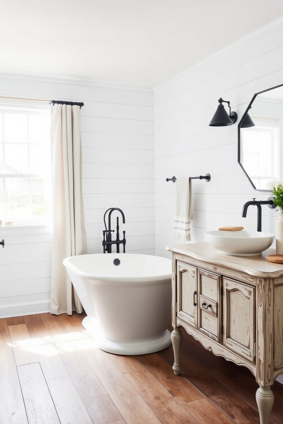 A charming farmhouse bathroom featuring pendant lighting that adds a rustic touch. The space includes a freestanding tub surrounded by reclaimed wood accents and a shiplap wall for a cozy atmosphere. The vanity is crafted from distressed wood with a farmhouse sink and vintage-style faucets. Soft white linens and potted greenery enhance the inviting feel of this serene retreat.