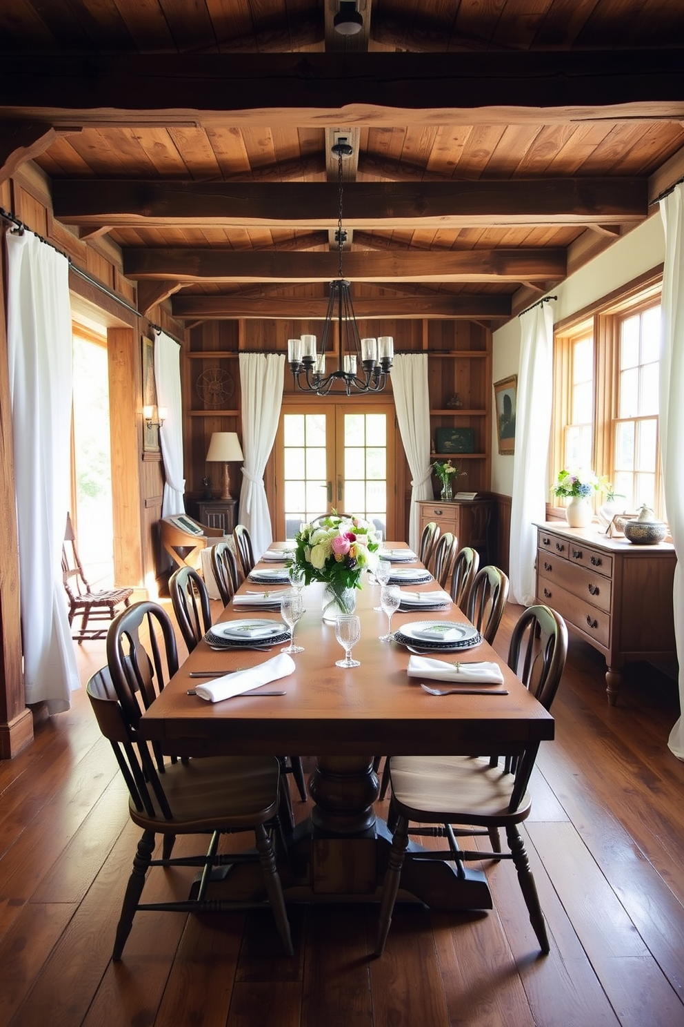 A charming farmhouse dining room with exposed wooden beams that enhance the rustic elegance of the space. The long wooden dining table is surrounded by mismatched chairs, creating a warm and inviting atmosphere. Natural light floods the room through large windows adorned with sheer white curtains. A centerpiece of fresh flowers sits atop the table, complemented by vintage tableware and soft linen napkins.