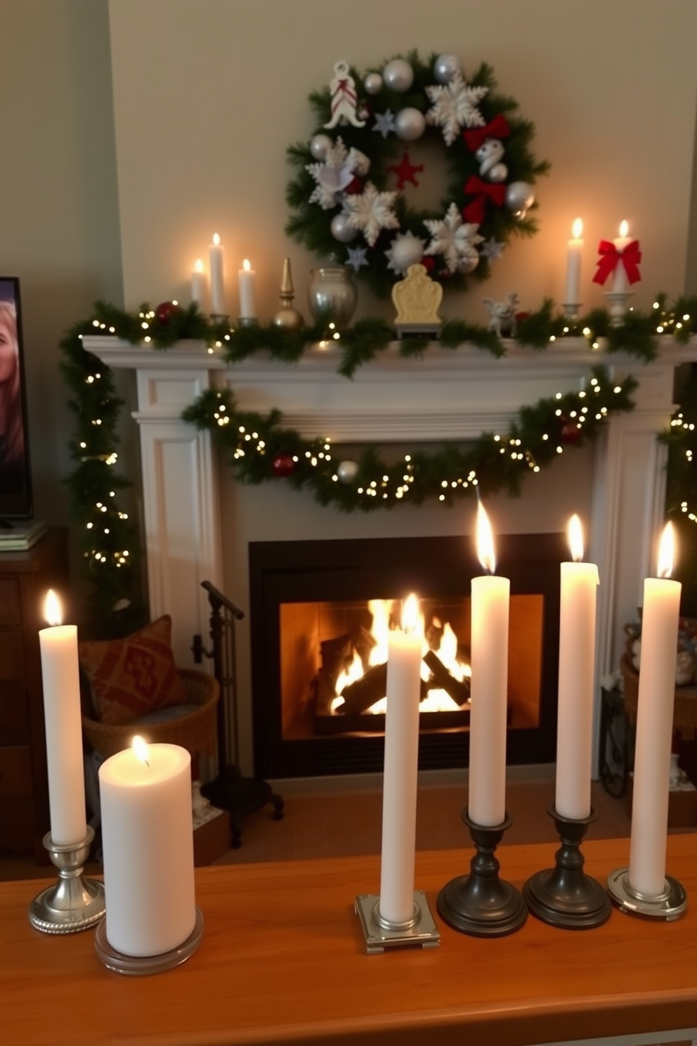 A cozy living room setting featuring candles of varied heights arranged on a wooden mantel. The warm glow of the candles complements the flickering flames of a fireplace decorated with festive Hanukkah ornaments and garlands.