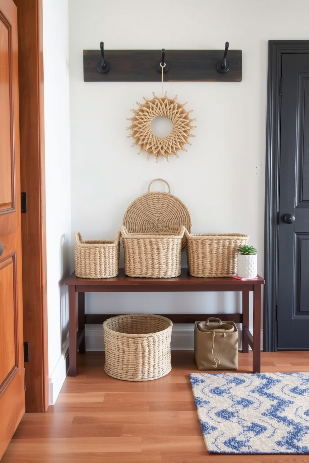 A stylish foyer entryway features decorative baskets neatly arranged on a wooden bench. The baskets are woven in natural tones, providing a warm and inviting touch while keeping clutter organized.