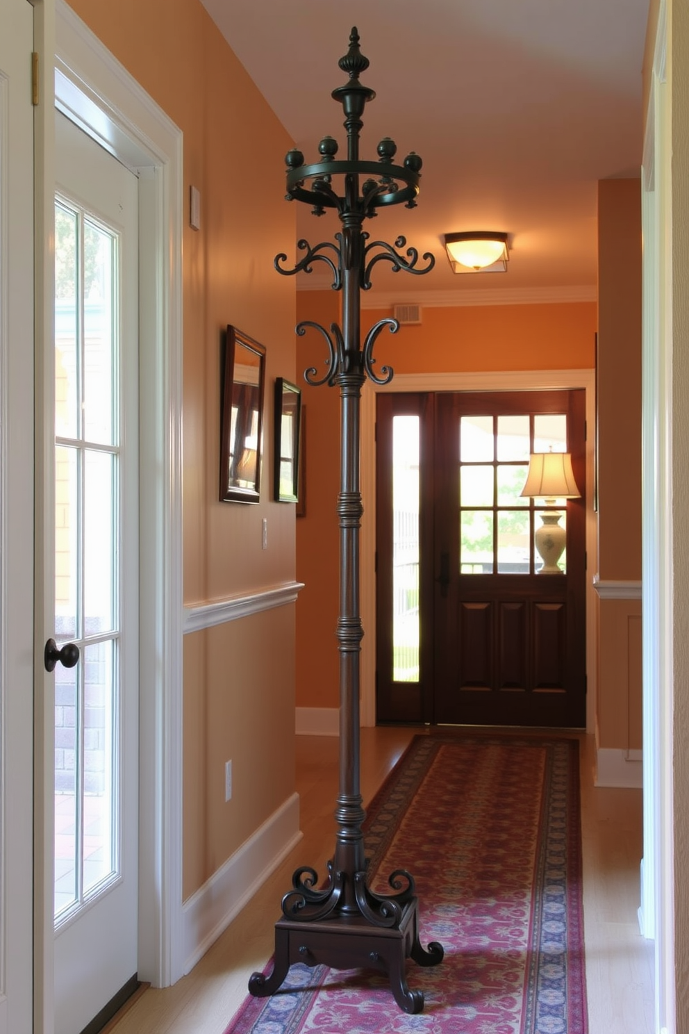 A vintage coat rack stands proudly in the foyer, crafted from dark wood with ornate detailing that adds character. The entryway features a warm color palette, with soft lighting illuminating the space and a patterned runner leading to the main area.