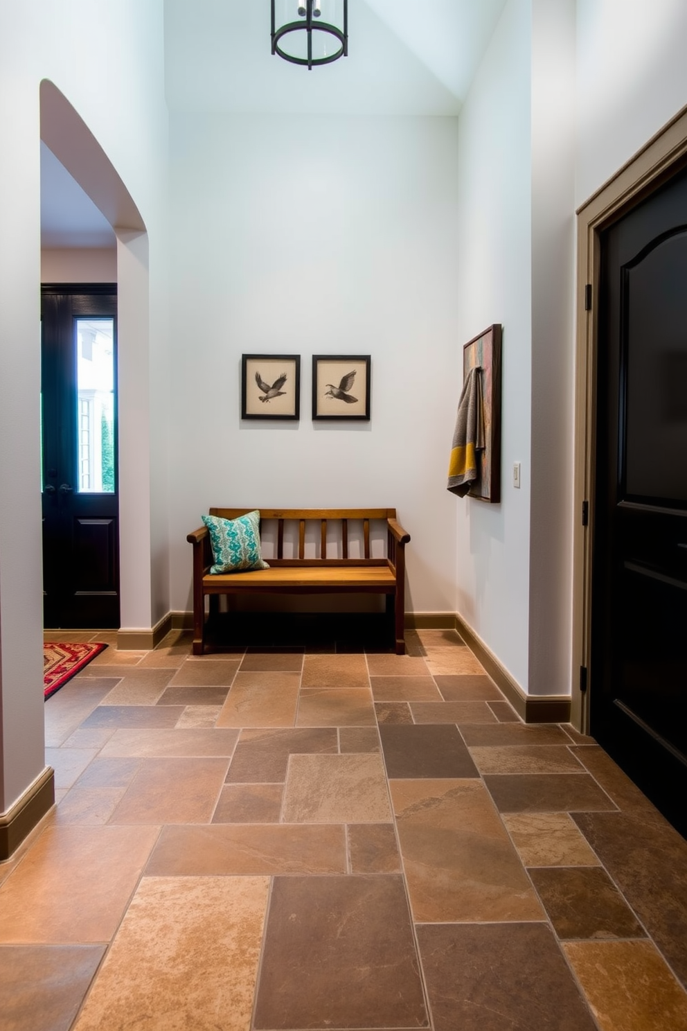 A striking foyer features neutral tiles with bold colored grout that adds a vibrant contrast. The arrangement creates an eye-catching entryway that welcomes guests with a modern flair. The walls are adorned with minimalist decor that complements the tile design. A stylish console table sits against one wall, topped with decorative items that enhance the overall aesthetic.