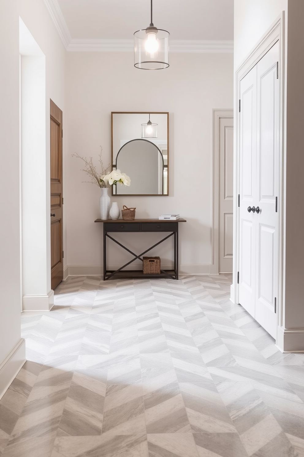 A stylish foyer featuring classic subway tiles in a crisp white finish that creates a timeless aesthetic. The floor is adorned with a geometric pattern that contrasts beautifully with the smooth walls, enhancing the entryway's charm. Elegant lighting fixtures hang from the ceiling, casting a warm glow over the space. A sleek console table against the wall displays decorative items, inviting guests into a welcoming atmosphere.