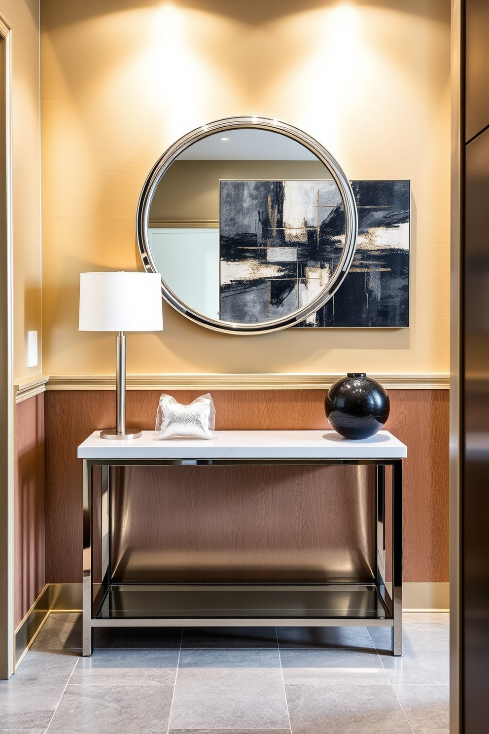 A stylish foyer featuring metallic finishes that create a chic and modern atmosphere. The walls are adorned with brushed gold panels, complemented by a sleek console table with a reflective surface. Above the console table, an oversized round mirror with a metallic frame enhances the sense of space. A striking piece of abstract art with metallic accents hangs on the wall, adding a touch of elegance to the entryway.