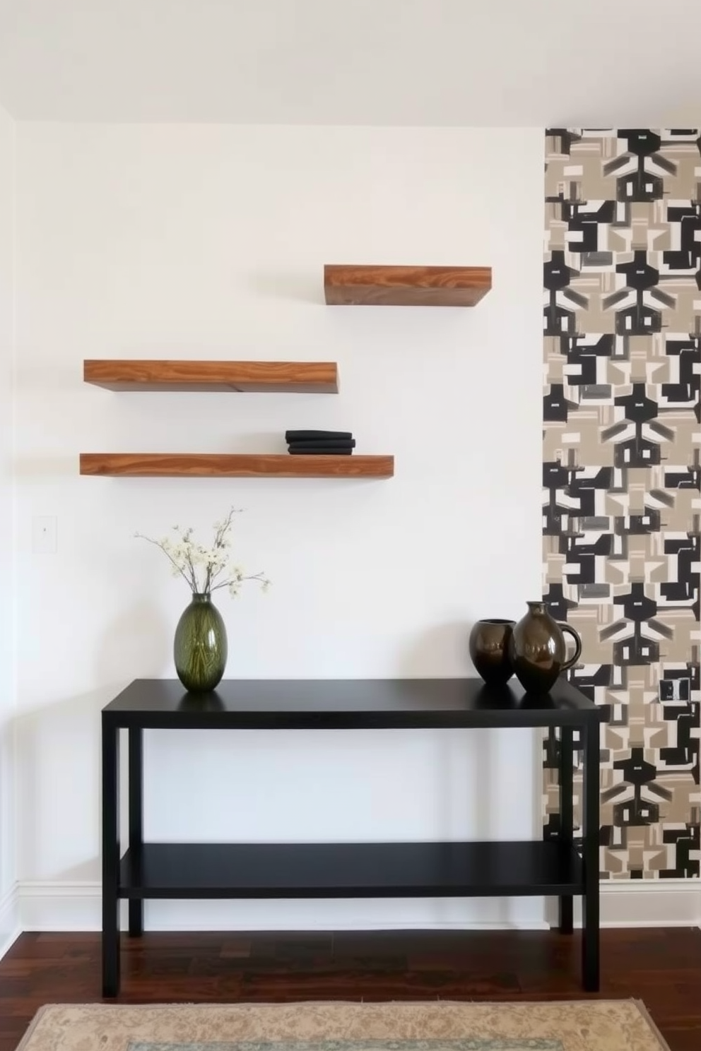 Floating shelves for decorative display. The shelves are made of reclaimed wood and are arranged asymmetrically on a white wall. Foyer wall design ideas. The wall features a bold geometric wallpaper with a contrasting color scheme, complemented by a sleek console table below.