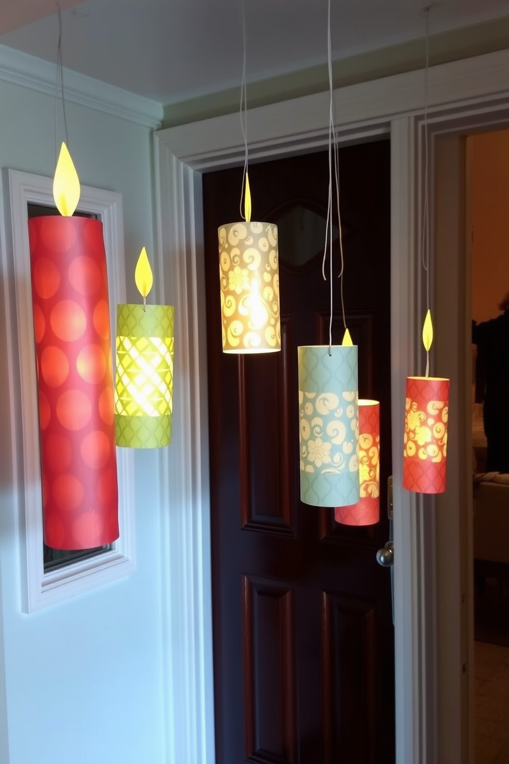 A welcoming front door adorned with hanging candles made from paper. The candles are intricately designed with festive patterns and glow softly, creating a warm and inviting atmosphere for Hanukkah celebrations.