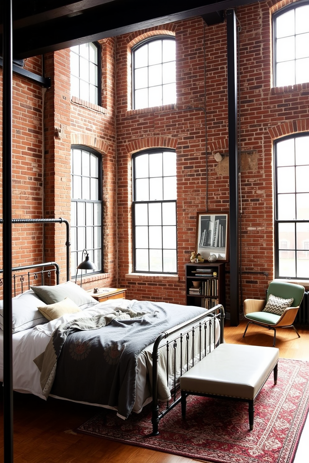 A stylish industrial loft bedroom featuring exposed brick walls that add character and warmth. The space includes a large metal-framed bed with plush bedding and a mix of vintage and modern furniture elements for a cohesive look. Large windows allow natural light to flood the room, highlighting the high ceilings and unique architectural details. A cozy reading nook with an armchair and a small bookshelf creates an inviting corner for relaxation.