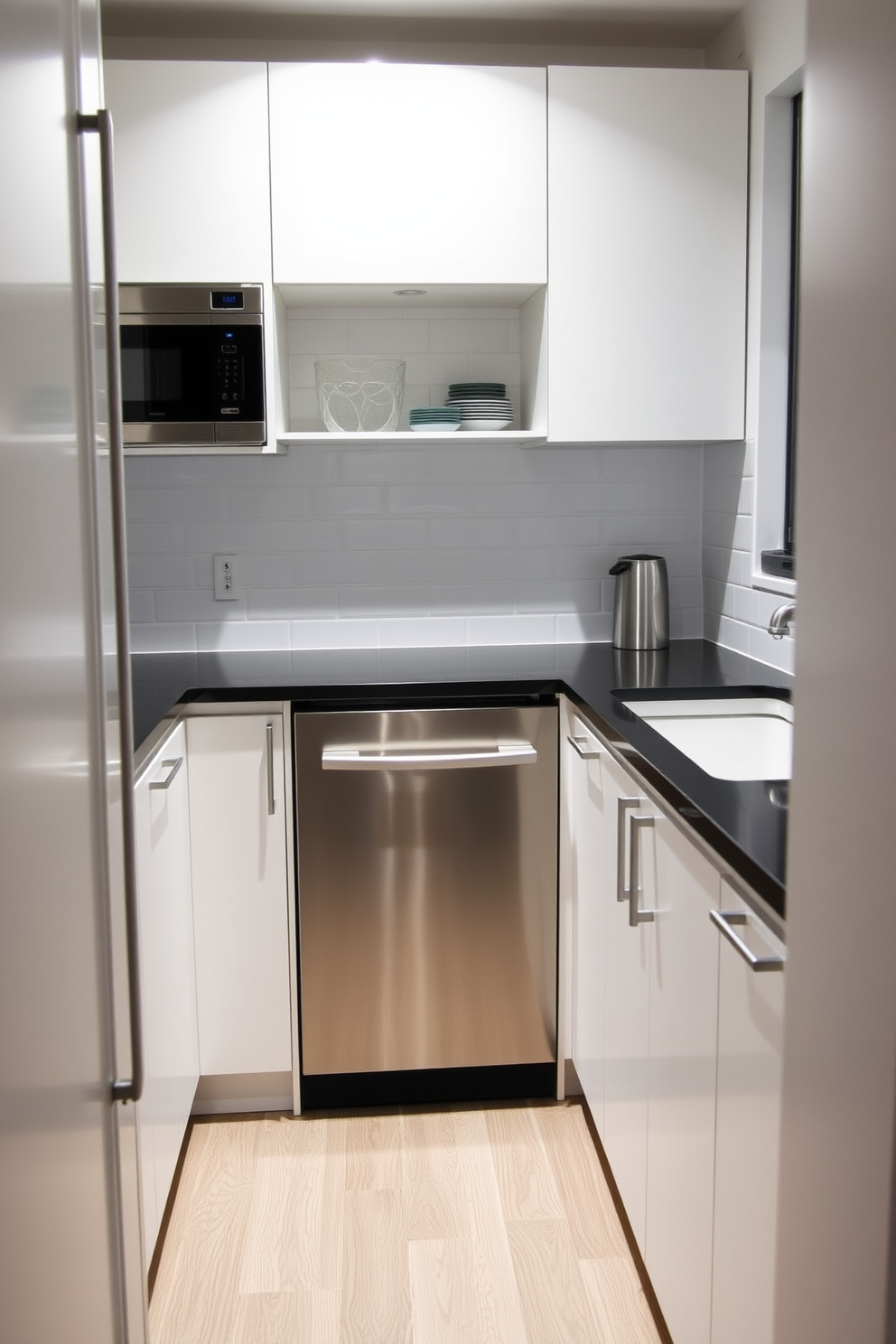 A galley kitchen featuring sleek cabinetry in a soft gray finish with a glossy white subway tile backsplash. Bright red bar stools are placed at a narrow breakfast counter, adding a vibrant pop of color to the space. The countertops are made of polished quartz, providing a clean and modern look. Open shelving displays colorful dishware, enhancing the kitchen's inviting atmosphere while maintaining functionality.