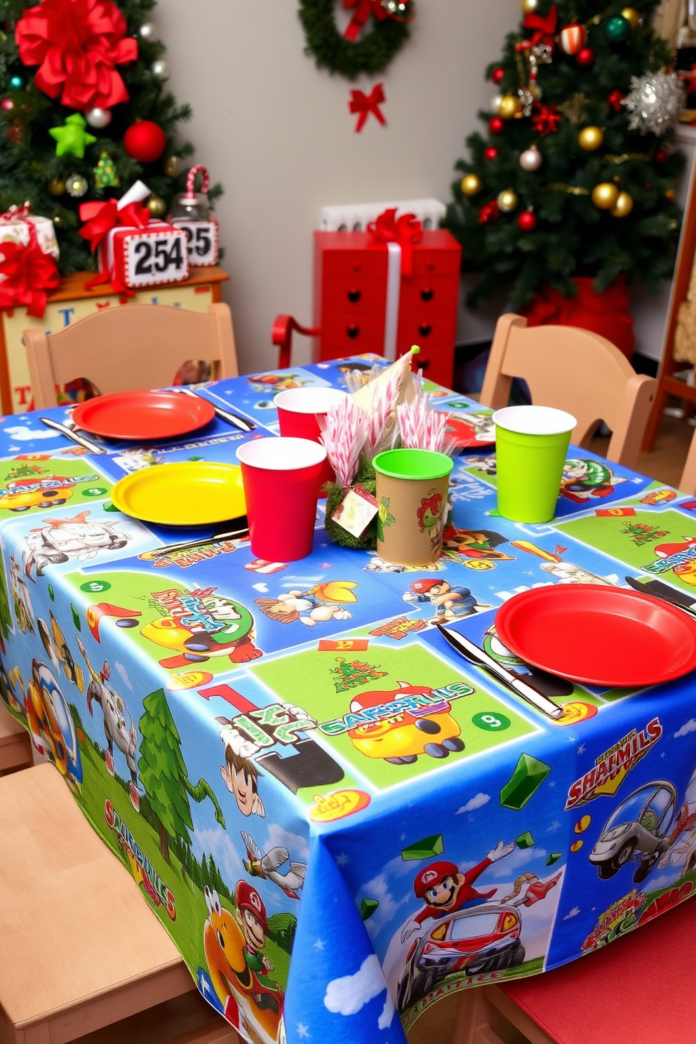 A festive tablecloth adorned with vibrant game graphics creates a playful atmosphere. The table is set with colorful plates and cups, surrounded by cheerful holiday decorations.