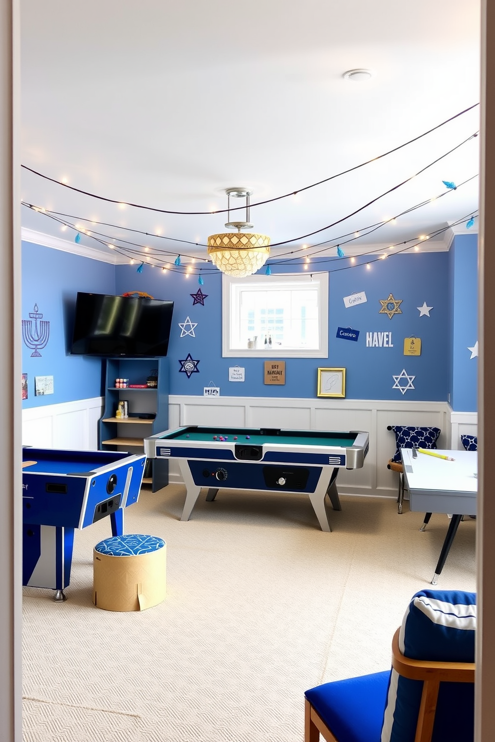 A festive game room designed with a blue and white color scheme. The walls are adorned with playful decorations celebrating Hanukkah, featuring star of David motifs and string lights for a cheerful ambiance.