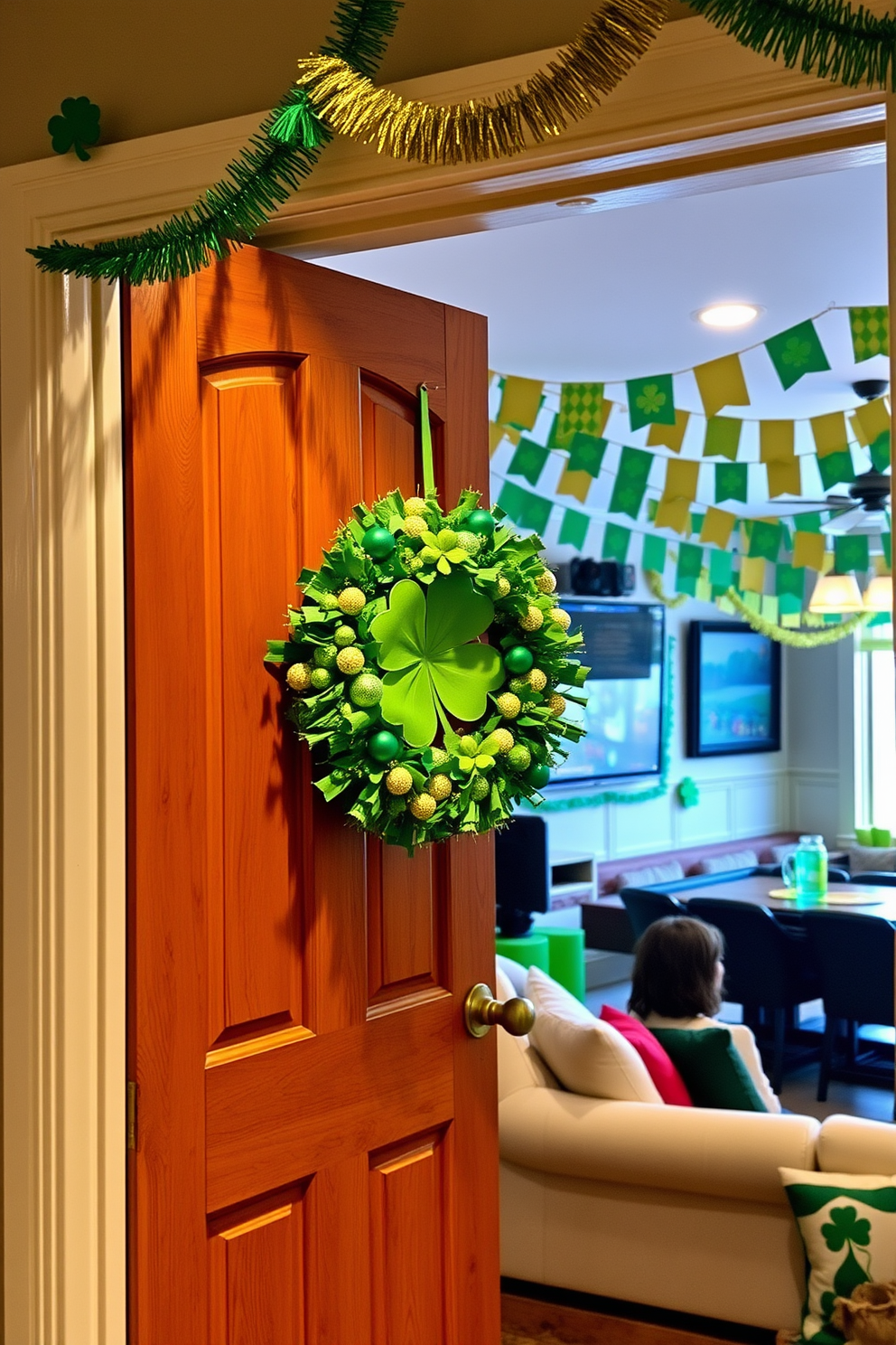 A decorative shamrock wreath is hanging on a rustic wooden door, adorned with vibrant green and gold accents. The entryway is welcoming, inviting guests into a festive game room filled with St. Patrick's Day decorations. Inside the game room, playful green and gold banners drape across the ceiling, complementing the cheerful atmosphere. A cozy seating area features plush cushions and themed decor, creating a perfect spot for celebrating the holiday with friends and family.