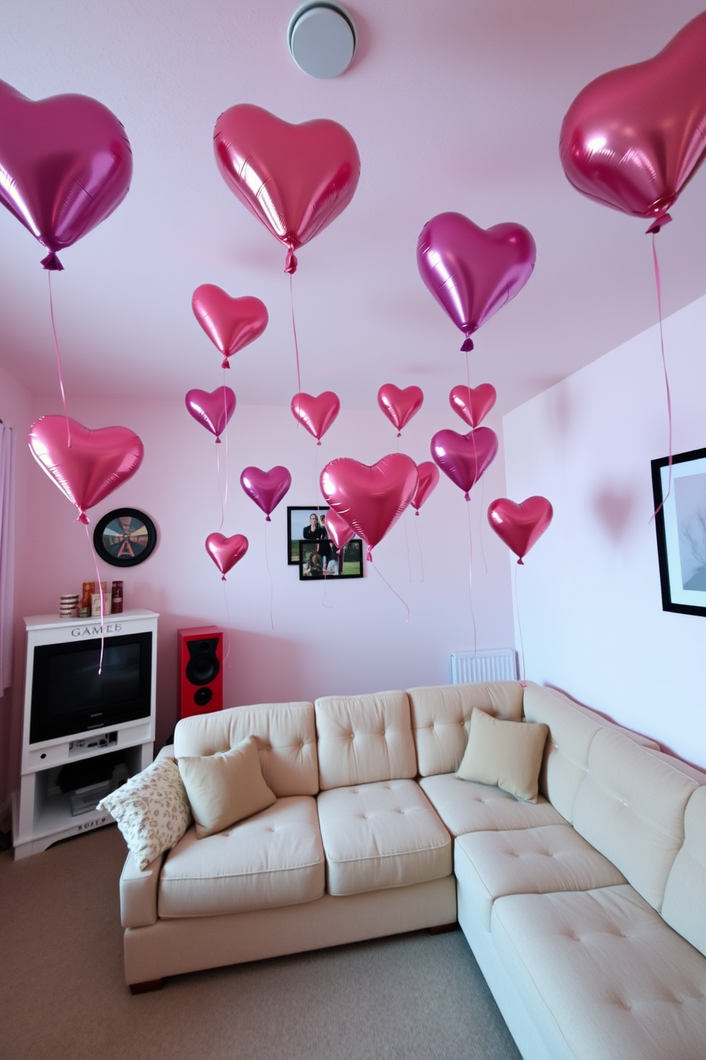 A cozy game room adorned for Valentine's Day features plush pink and red blankets draped over stylish couches. Soft lighting creates an inviting atmosphere, while heart-themed decorations add a playful touch to the space.