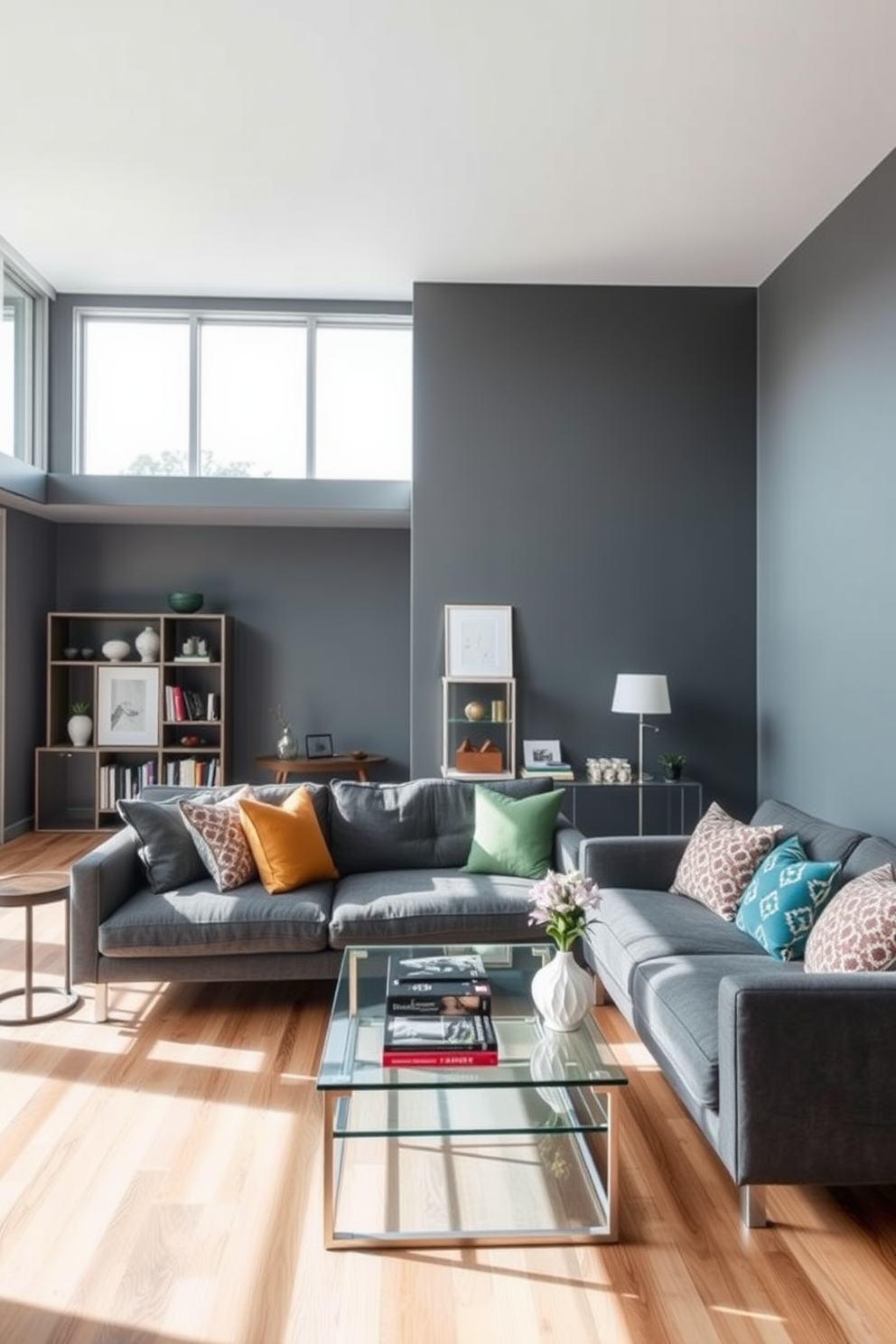 A chic apartment interior featuring layered gray paint on the walls to create depth and interest. The space includes a modern gray sofa adorned with colorful throw pillows and a sleek coffee table made of glass and metal. Floor-to-ceiling windows allow natural light to flood the room, enhancing the airy atmosphere. A minimalist bookshelf filled with art books and decorative items adds personality to the space.