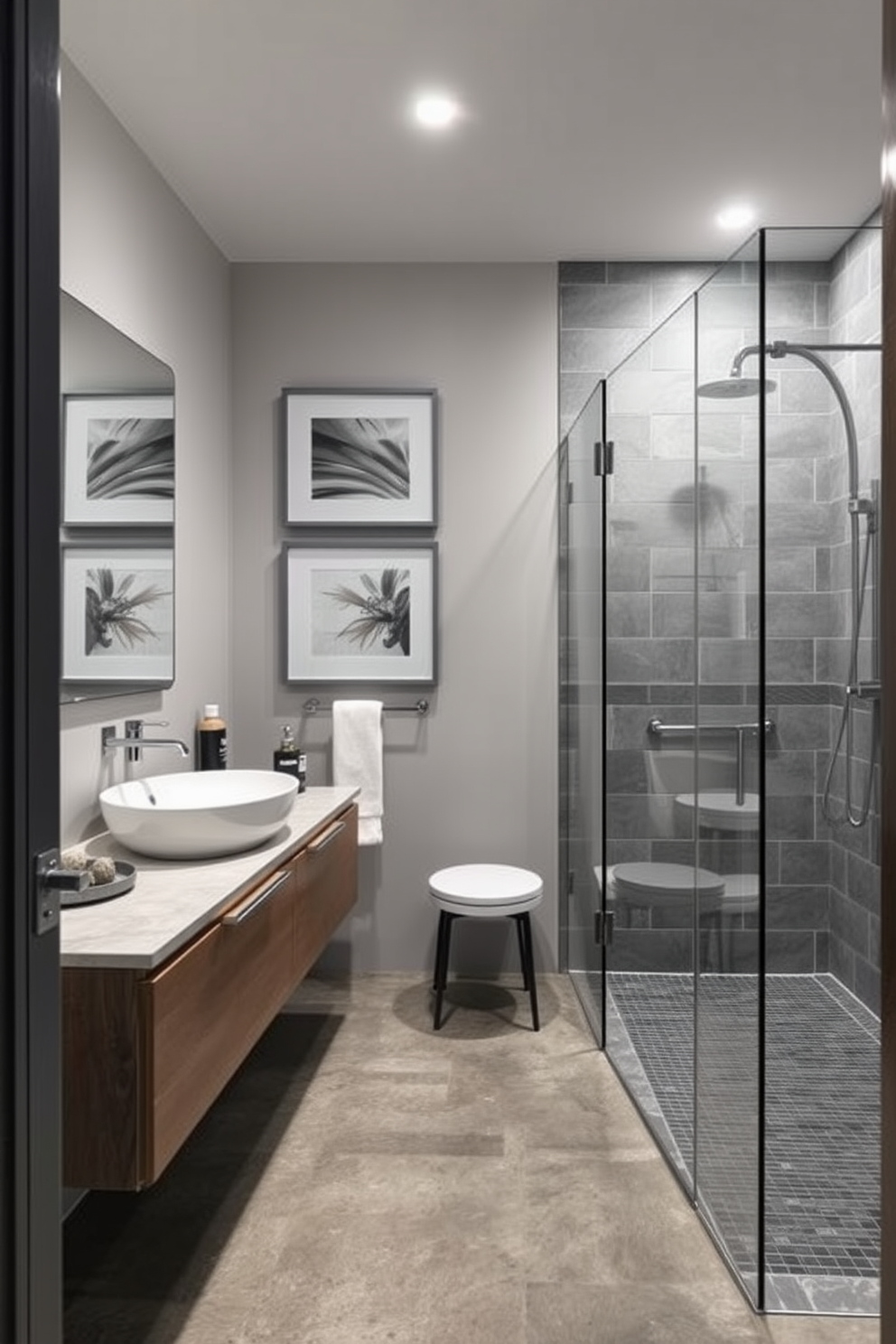 A modern bathroom featuring bold gray accents against a pristine white backdrop. The walls are adorned with sleek gray tiles, and a freestanding soaking tub sits elegantly in the center, surrounded by minimalist decor. A spacious walk-in shower with glass doors showcases a striking gray stone wall. Complementing the design, a double vanity with white cabinetry and gray countertops adds functionality and style.