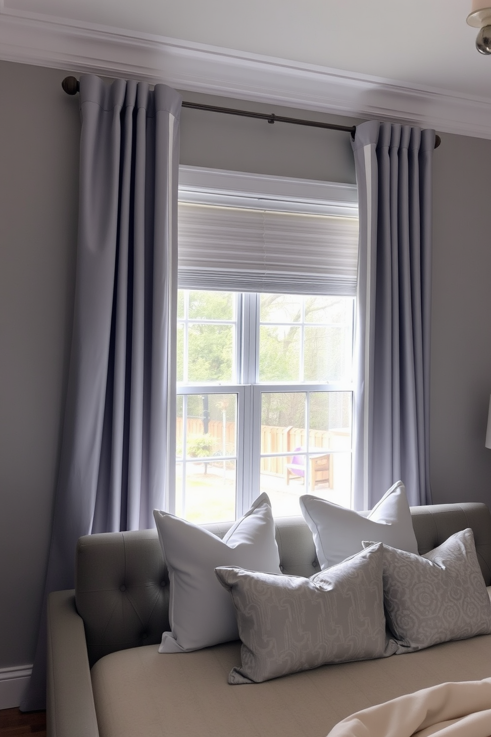 A serene gray bedroom featuring light gray curtains that billow gently with the breeze, creating an airy and inviting atmosphere. The walls are painted in a soft gray hue, complemented by a plush gray upholstered bed adorned with crisp white linens and decorative pillows.