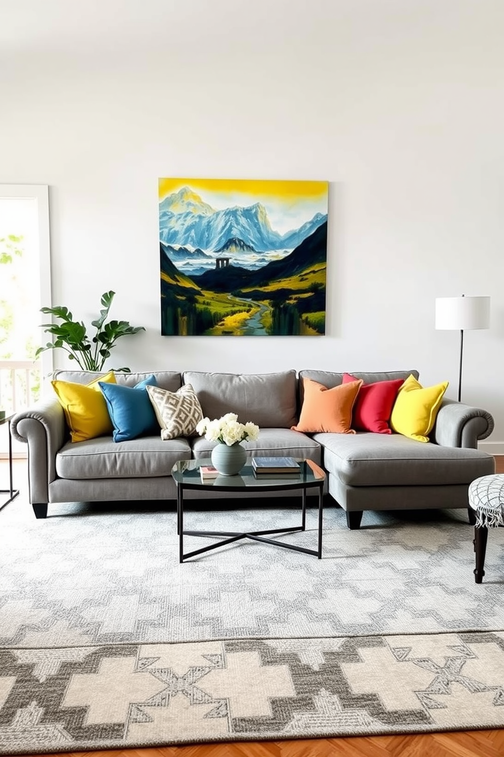 A neutral gray sofa is the centerpiece of the family room, adorned with vibrant cushions in shades of blue, yellow, and coral. The walls are painted in a soft white, and a large area rug with geometric patterns anchors the seating area.