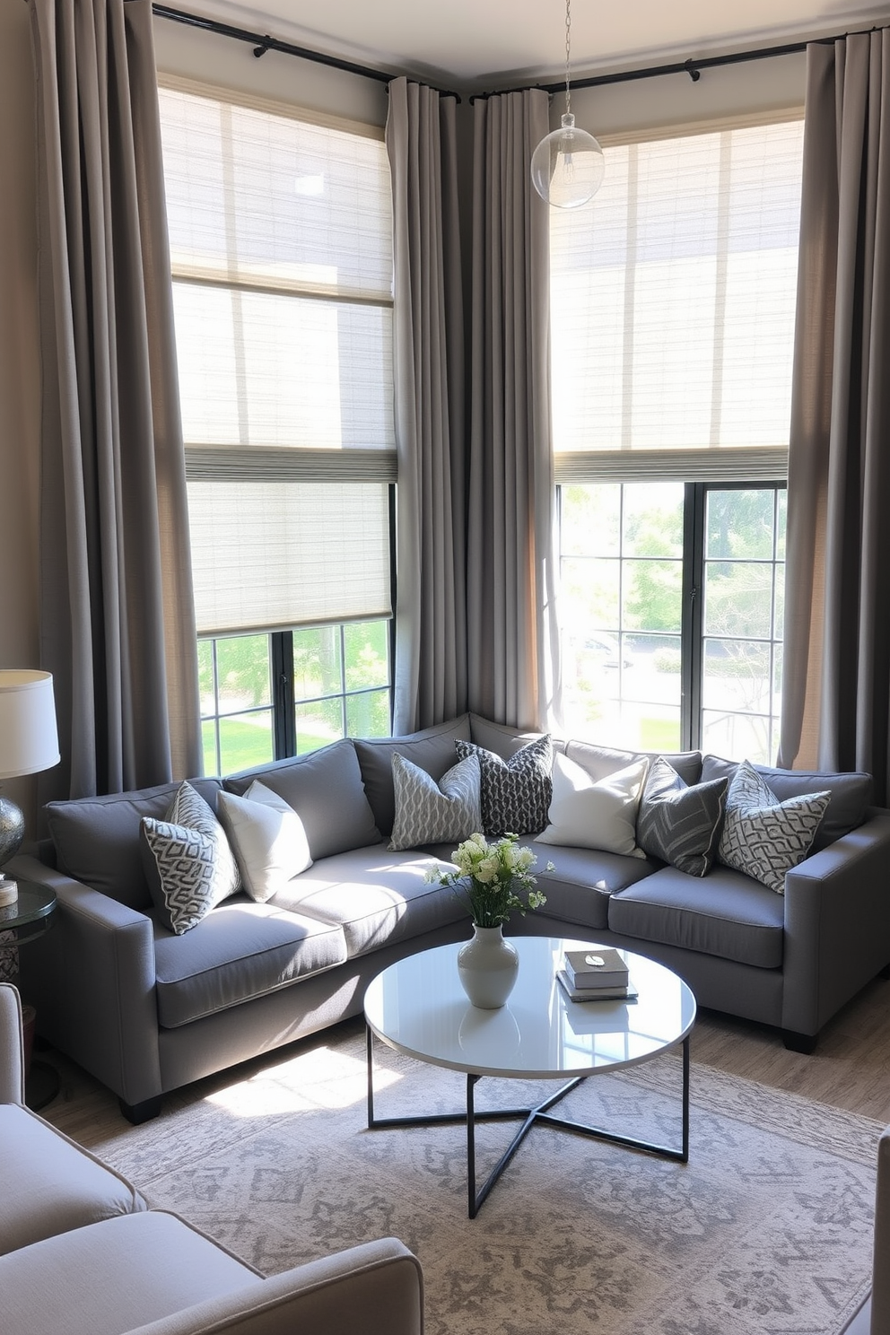 A cozy family room featuring gray window treatments that create a soft and inviting atmosphere. The space is adorned with a plush gray sectional sofa, complemented by a mix of patterned throw pillows in subtle hues. Natural light filters in through the gray drapes, enhancing the warm ambiance of the room. A stylish area rug anchors the seating arrangement, while a modern coffee table adds a touch of elegance.