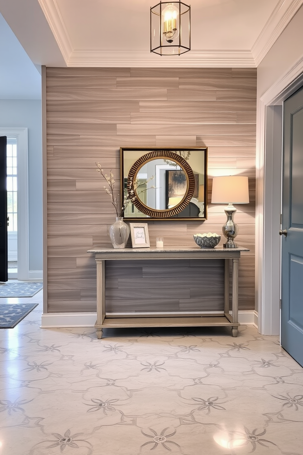 A serene foyer space featuring a harmonious blend of gray and beige tones. The walls are painted in a soft gray while the floor showcases elegant beige tiles that create a welcoming atmosphere. A stylish console table in a light wood finish stands against the wall, adorned with decorative items in complementary colors. A large round mirror with a simple frame hangs above the table, enhancing the sense of space and light.