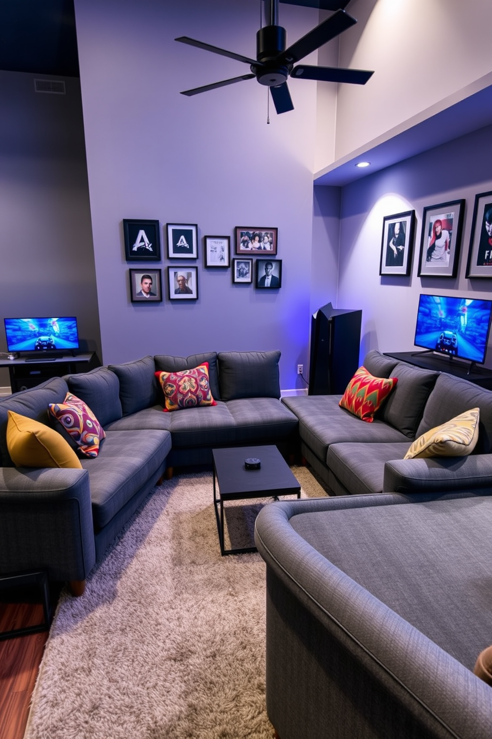 A cozy gray sectional sofa arrangement is the focal point of the game room. The sofa is complemented by a plush area rug and a set of colorful throw pillows for added comfort. The game room features a sleek gaming console setup against a feature wall adorned with framed artwork. Soft ambient lighting enhances the relaxed atmosphere, while a small coffee table sits in front of the sofa for convenience.