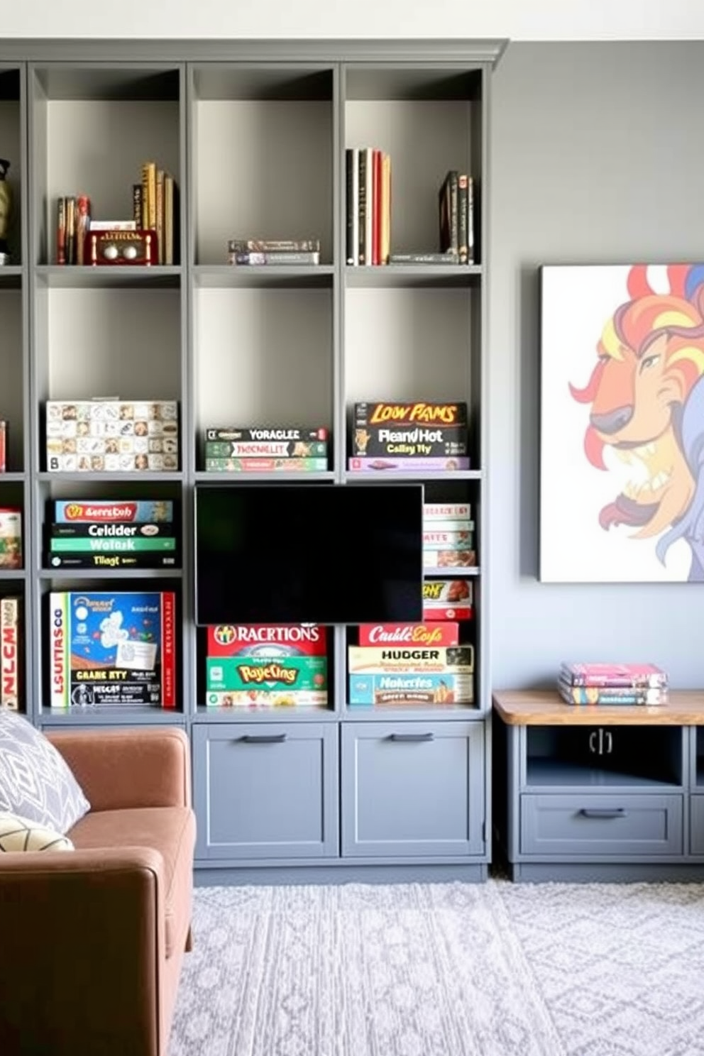 A modern game room featuring gray shelving designed specifically for board game storage. The room is accented with comfortable seating and vibrant wall art that reflects a playful atmosphere.