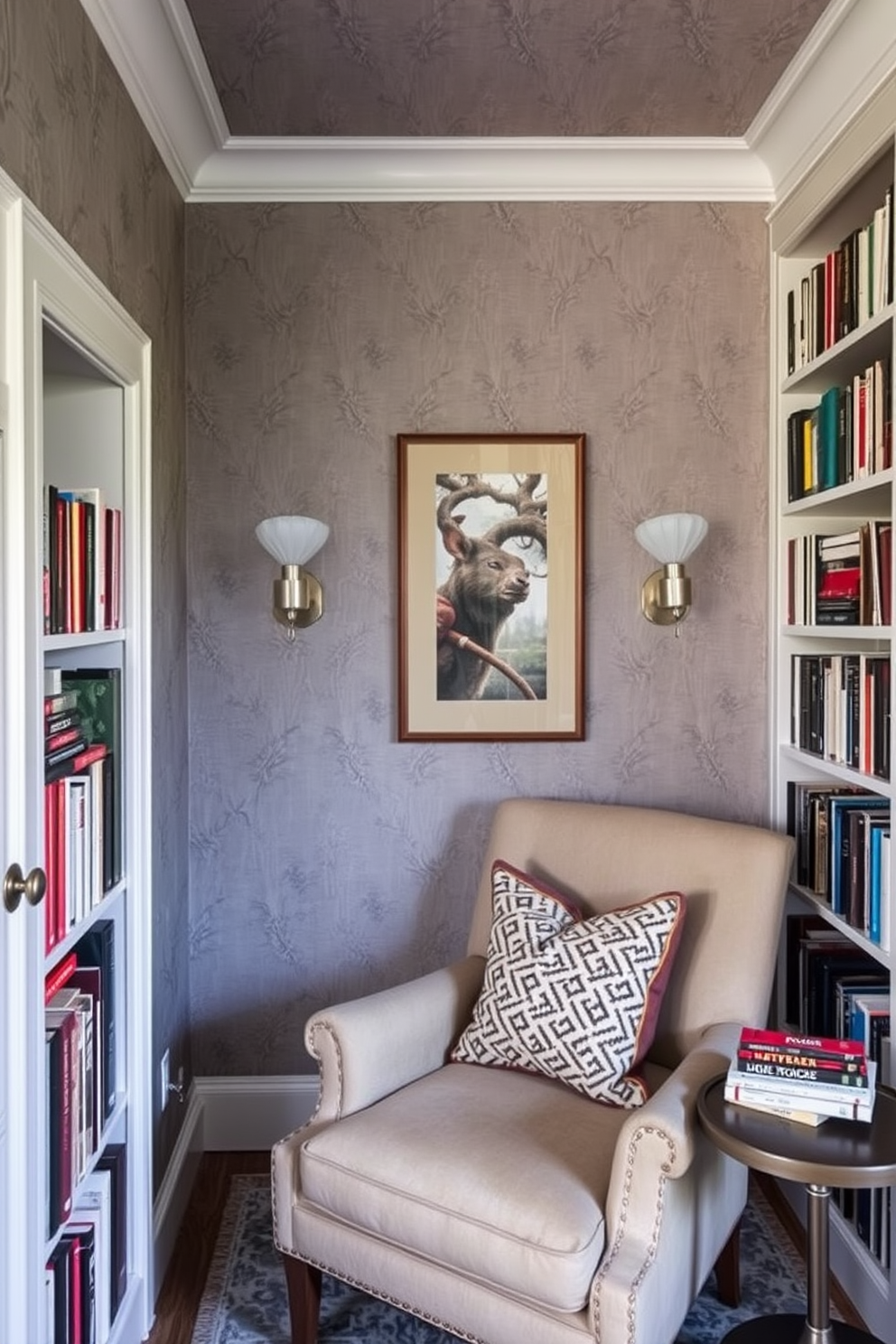 A cozy home library featuring gray bookshelves filled with colorful book spines. The walls are painted in a soft white hue, and a plush reading nook with a comfortable armchair is positioned near a large window.