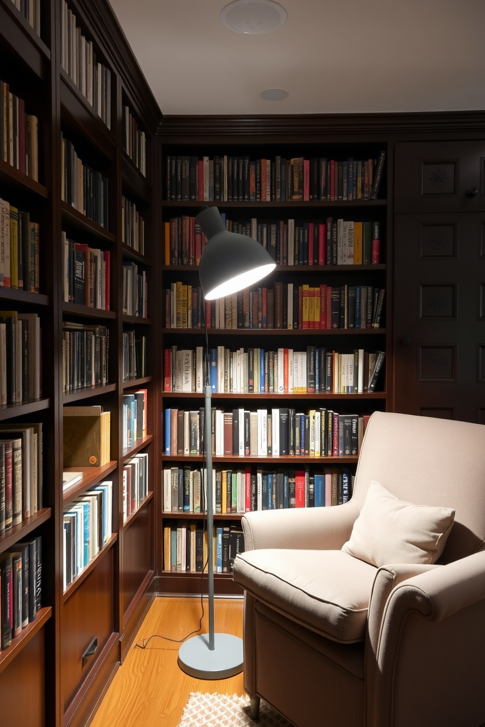 A cozy home library features open gray shelving that provides easy access to a curated collection of books and decorative items. Soft lighting illuminates the space, creating a warm atmosphere perfect for reading and relaxation.