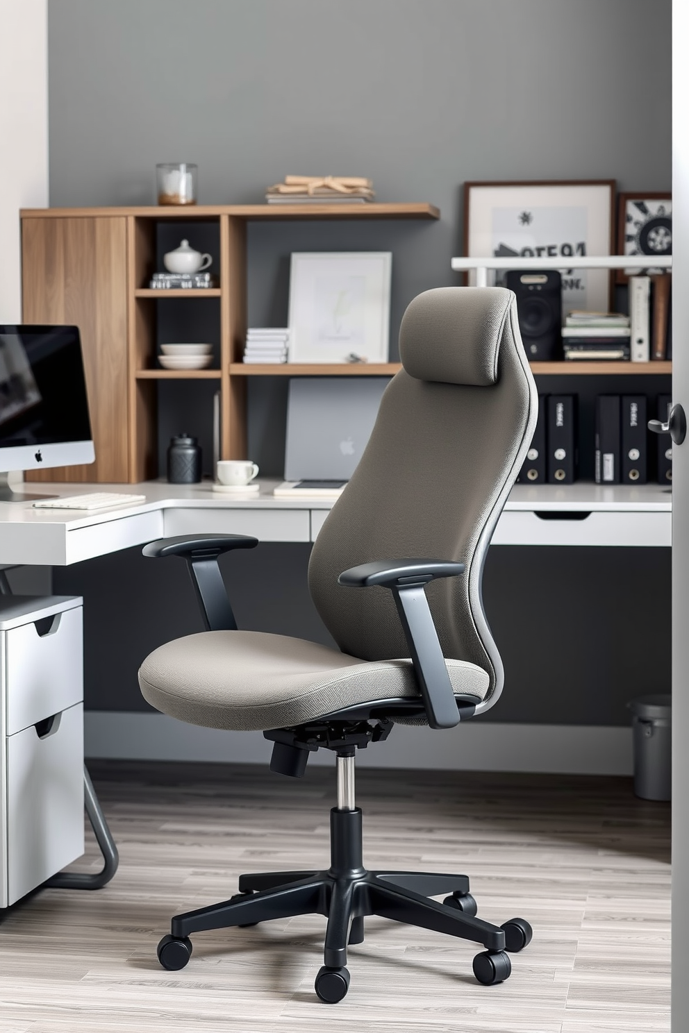 Ergonomic gray office chair designed for maximum comfort and support. The chair features adjustable height and lumbar support, complemented by a sleek gray finish that blends seamlessly into a modern home office environment. Gray home office design ideas that emphasize functionality and style. Incorporate a minimalist desk, stylish shelving, and subtle lighting to create a productive workspace that inspires creativity and focus.