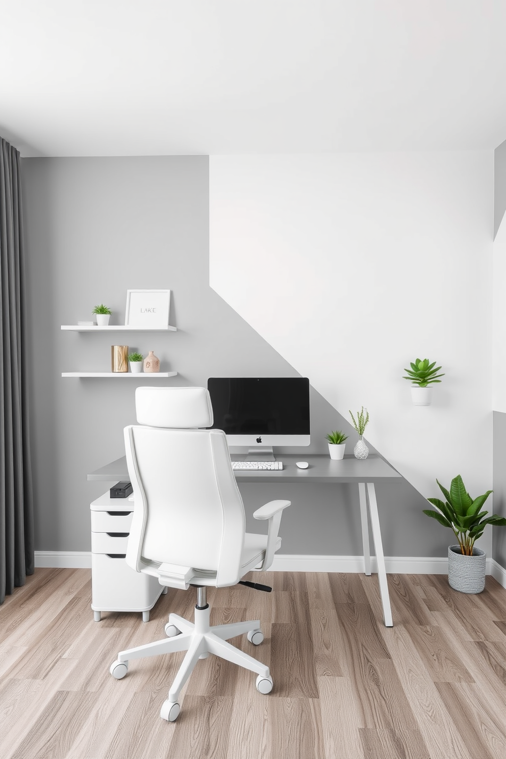 A modern home office featuring a gray and white color block design. The walls are divided into alternating sections of soft gray and bright white, creating a fresh and dynamic atmosphere. A sleek gray desk sits in the center, complemented by a white ergonomic chair. Shelves with minimalist decor and potted plants add a touch of greenery against the neutral backdrop.